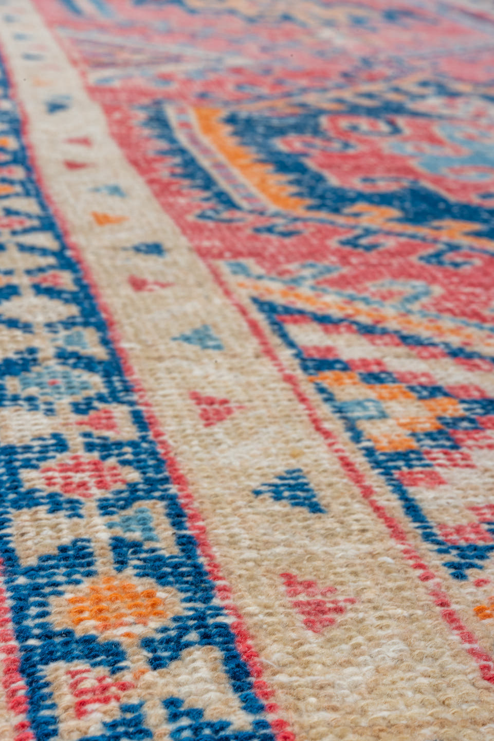 3' x 9' one-of-a-kind handmade vintage Heriz runner rug. Color palette: coral, ivory, navy, sky_blue, rose, saffron