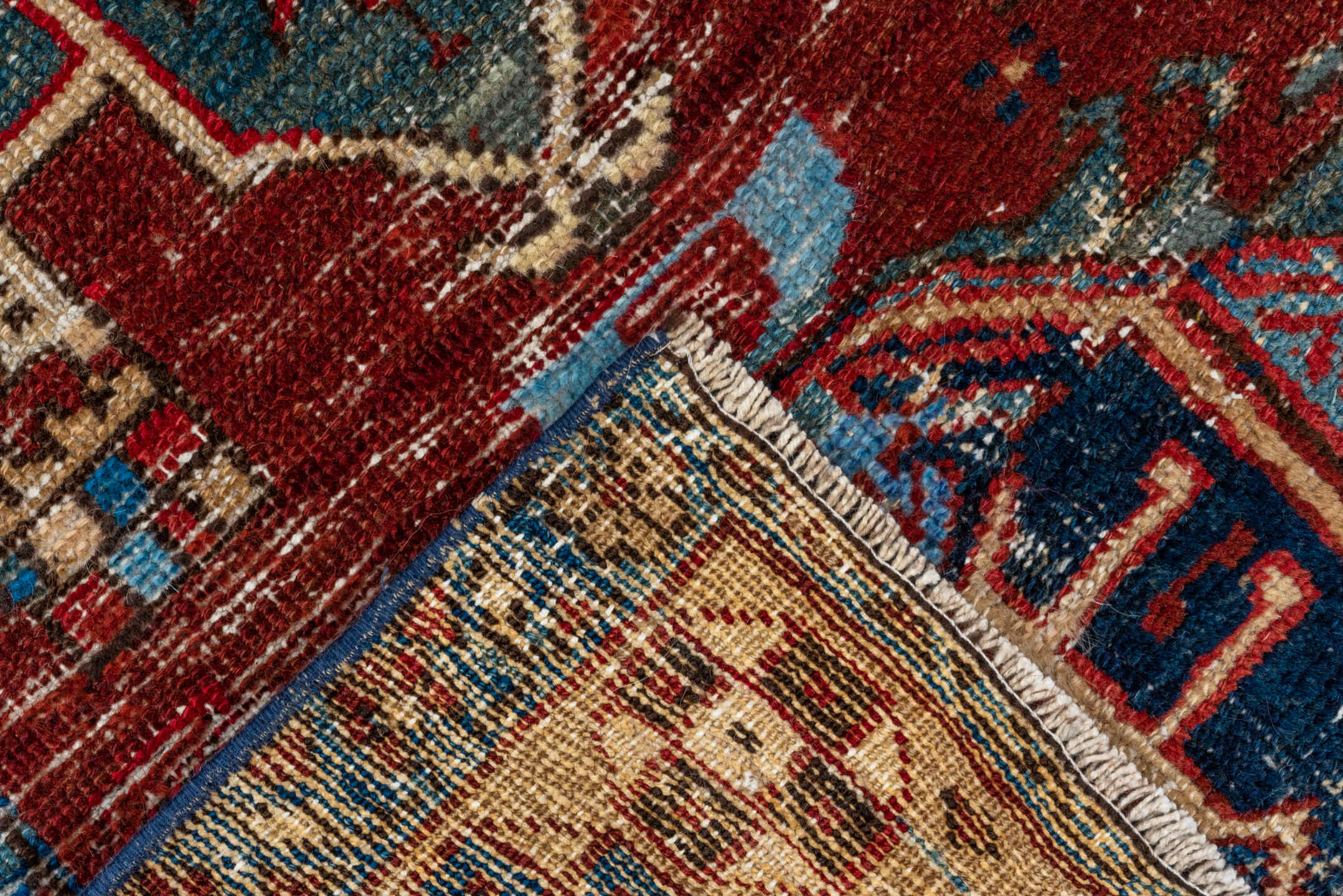 2' x 8' one-of-a-kind handmade vintage Heriz runner rug. Color palette: rust, ivory, navy, indigo, camel, taupe, burgundy