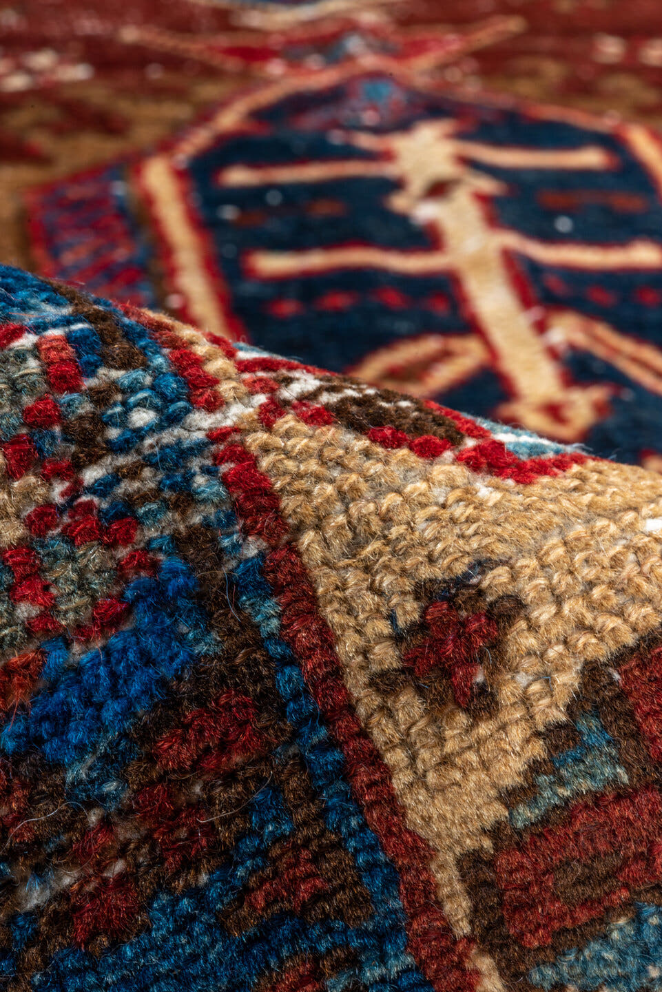 2' x 8' one-of-a-kind handmade vintage Heriz runner rug. Color palette: rust, ivory, navy, indigo, camel, taupe, burgundy