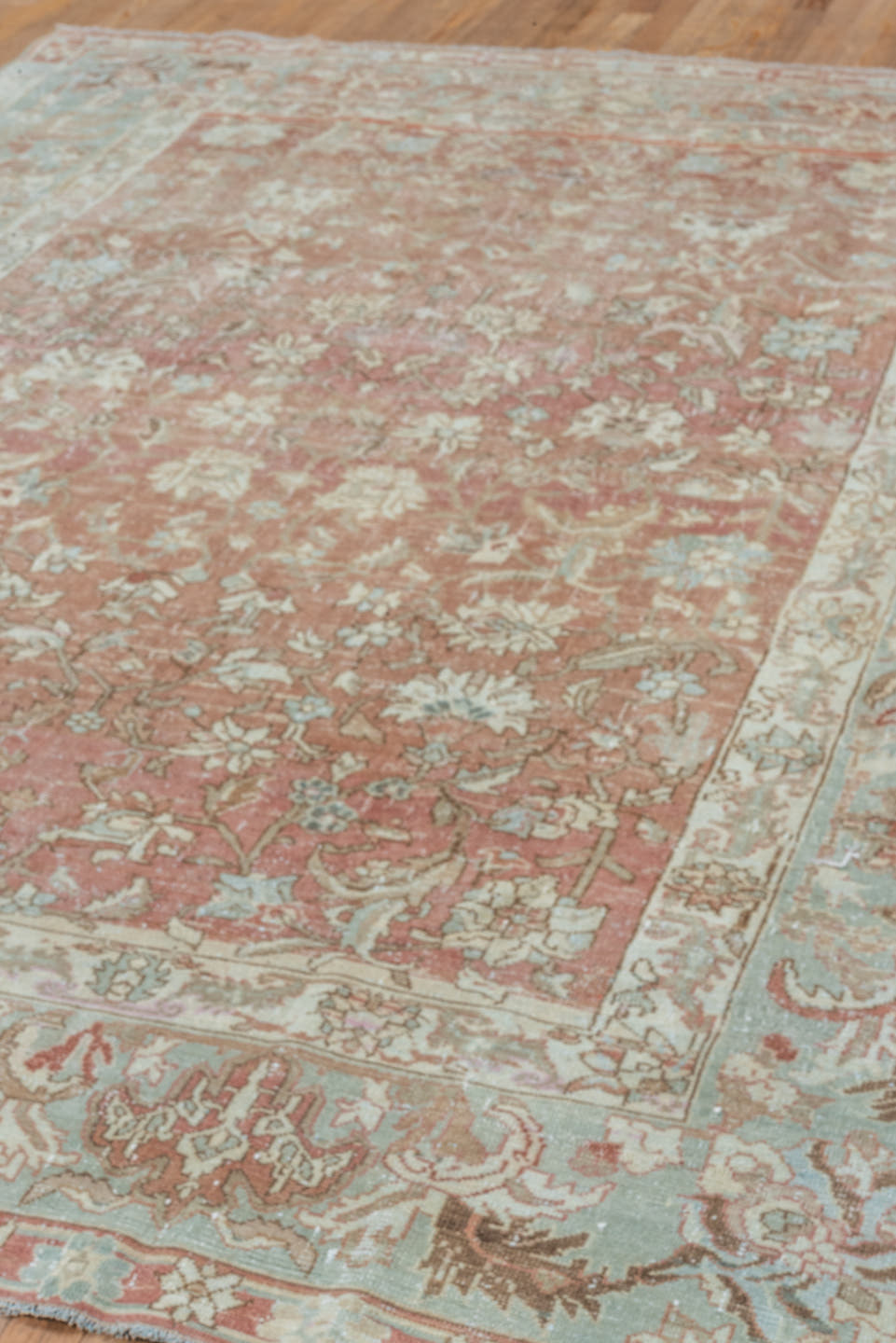 7' x 9' one-of-a-kind handmade vintage Malayer rug. Color palette: rose, pale blue, ivory, terra cotta, taupe, camel, brown