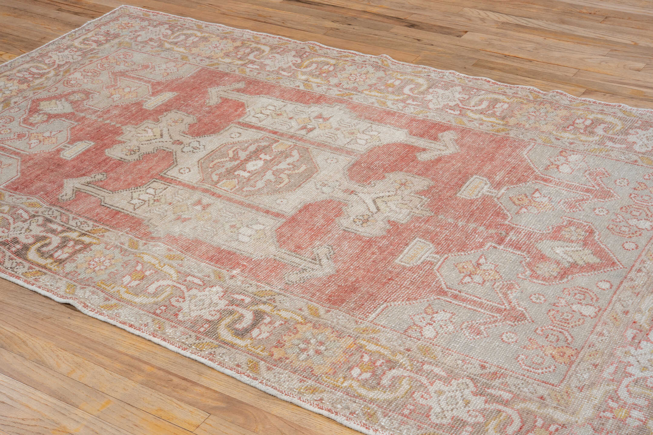 4' x 7' one-of-a-kind handmade vintage Oushak rug. Color palette: coral, ivory, taupe, gold, rust, beige, terracotta, gray