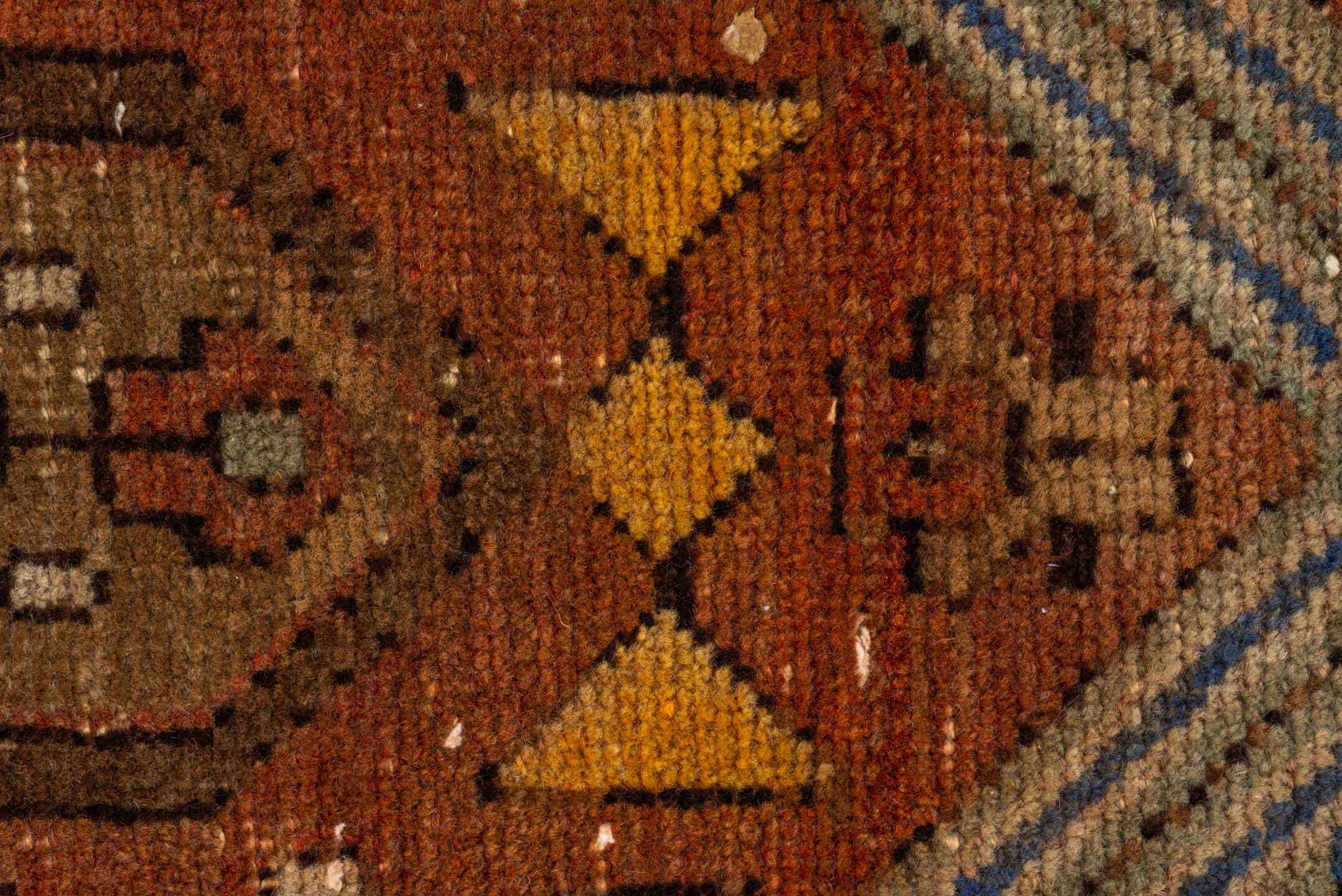 3' x 10' one-of-a-kind handmade vintage Heriz runner rug. Color palette: rust, camel, cobalt, ivory, gold, taupe, brown
