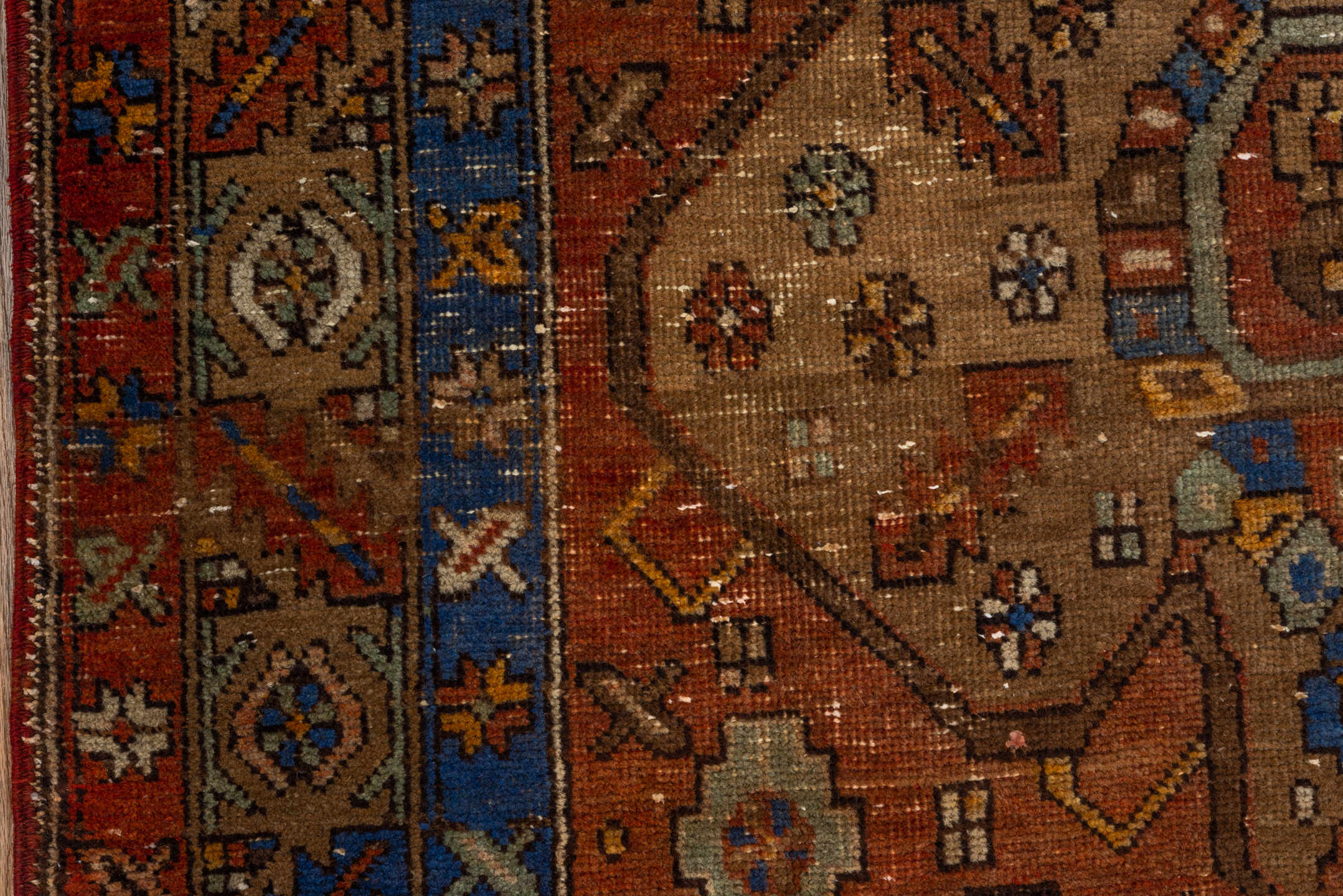 3' x 10' one-of-a-kind handmade vintage Heriz runner rug. Color palette: blue, brown, gray, pink, saddle brown