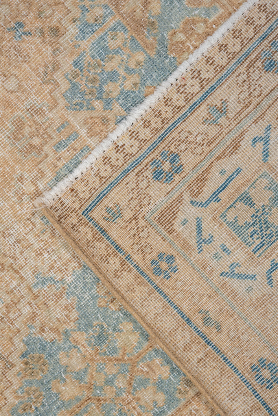 7' x 10' one-of-a-kind handmade vintage Joshegan large size rug. Color palette: camel, ivory, sky_blue, taupe, tan