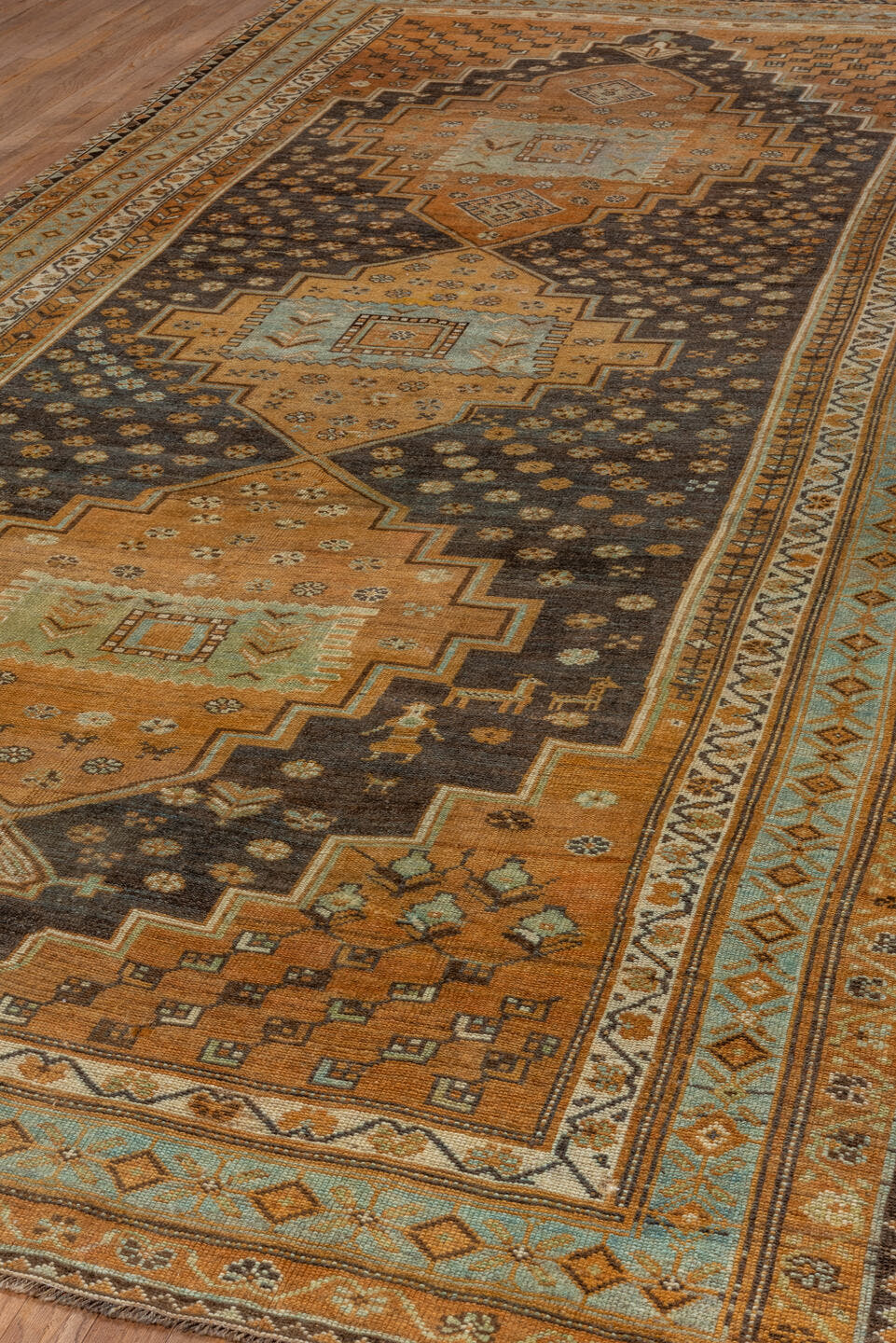 6' x 12' one-of-a-kind handmade vintage Kurd large size rug. Color palette: camel, brown, sky blue, ivory, taupe, charcoal