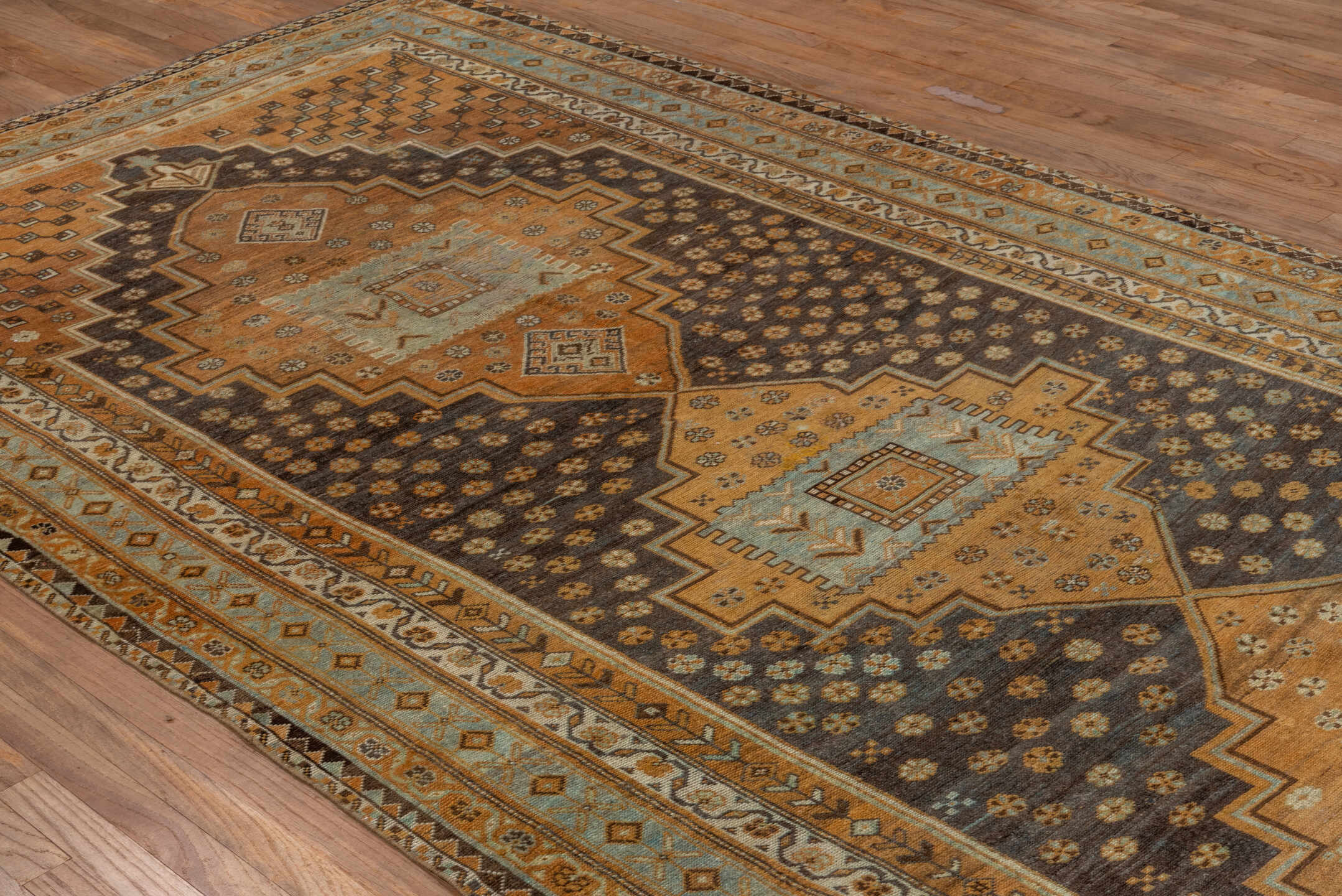 6' x 12' one-of-a-kind handmade vintage Kurd large size rug. Color palette: camel, brown, sky blue, ivory, taupe, charcoal