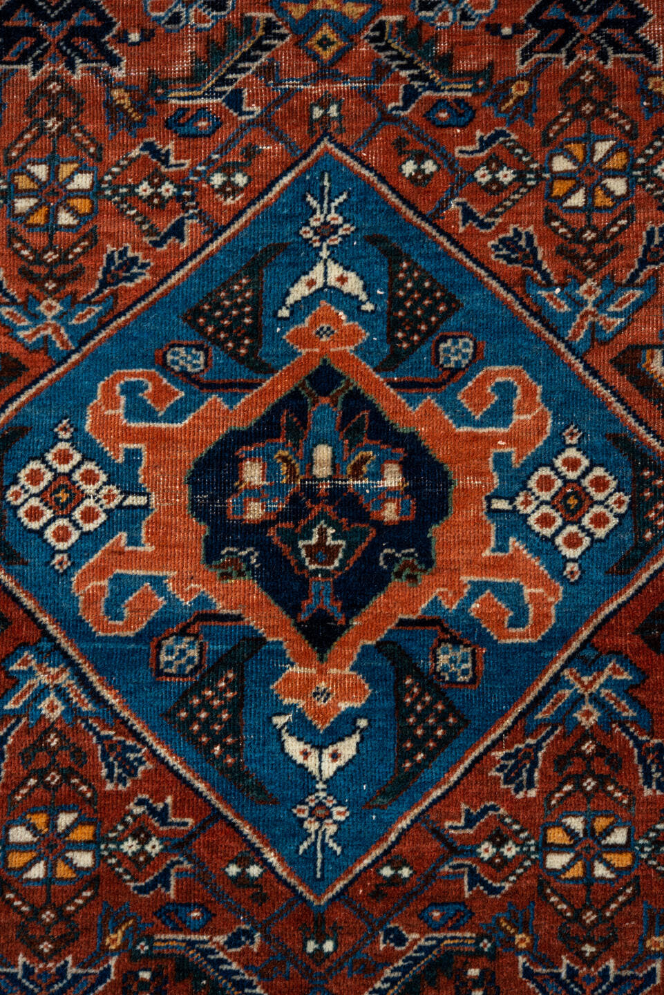 3' x 5' one-of-a-kind handmade vintage Shiraz small size rug. Color palette: rust, turquoise, navy, ivory, camel, brown