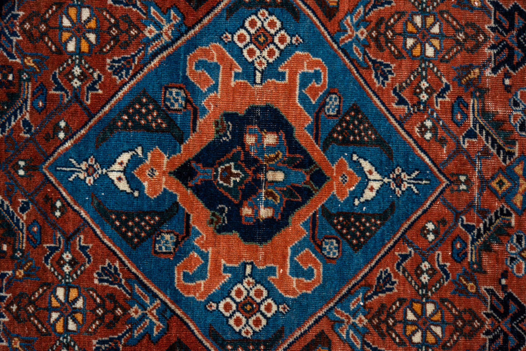 3' x 5' one-of-a-kind handmade vintage Shiraz small size rug. Color palette: rust, turquoise, navy, ivory, camel, brown