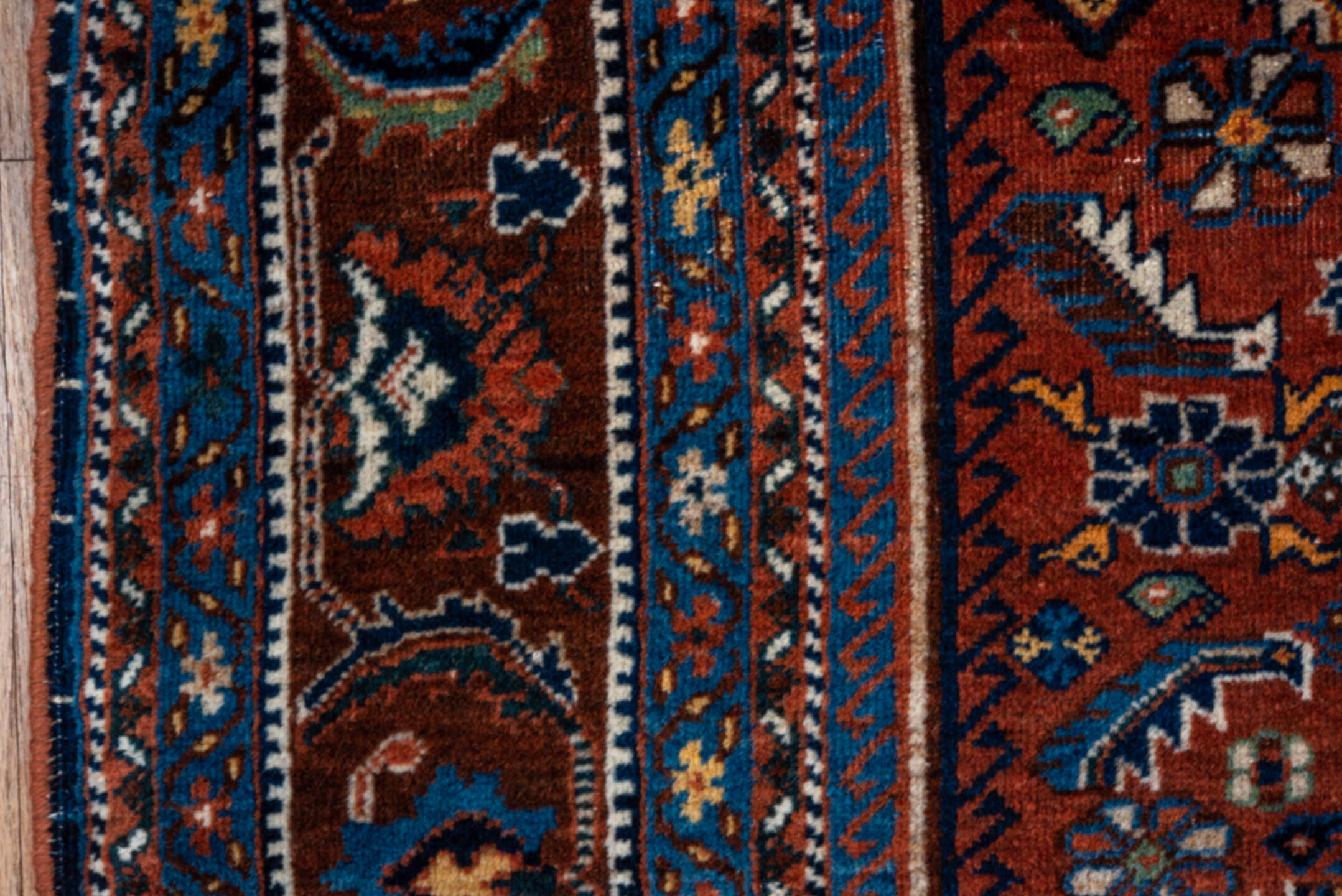 3' x 5' one-of-a-kind handmade vintage Shiraz small size rug. Color palette: rust, turquoise, navy, ivory, camel, brown