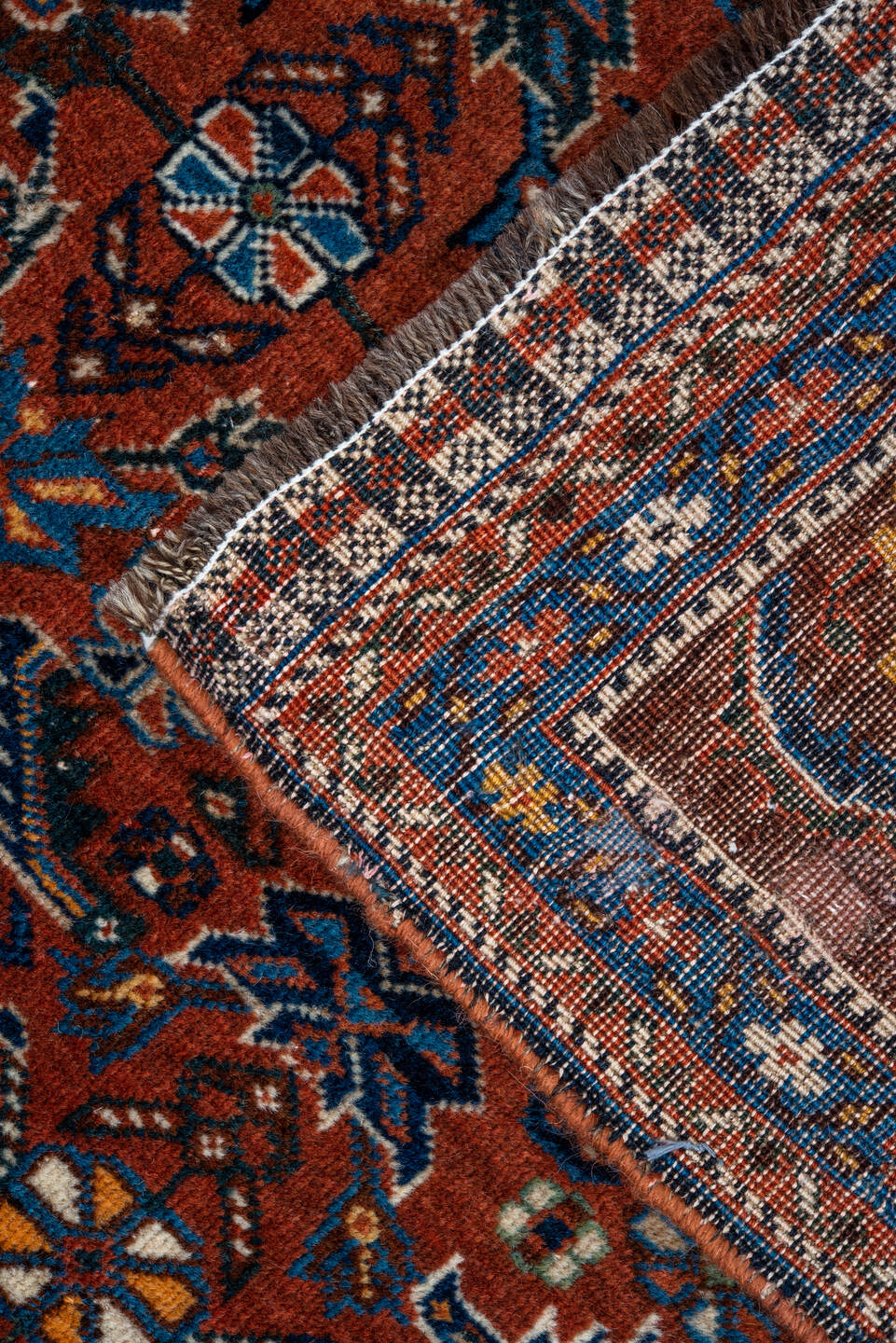 3' x 5' one-of-a-kind handmade vintage Shiraz small size rug. Color palette: rust, turquoise, navy, ivory, camel, brown