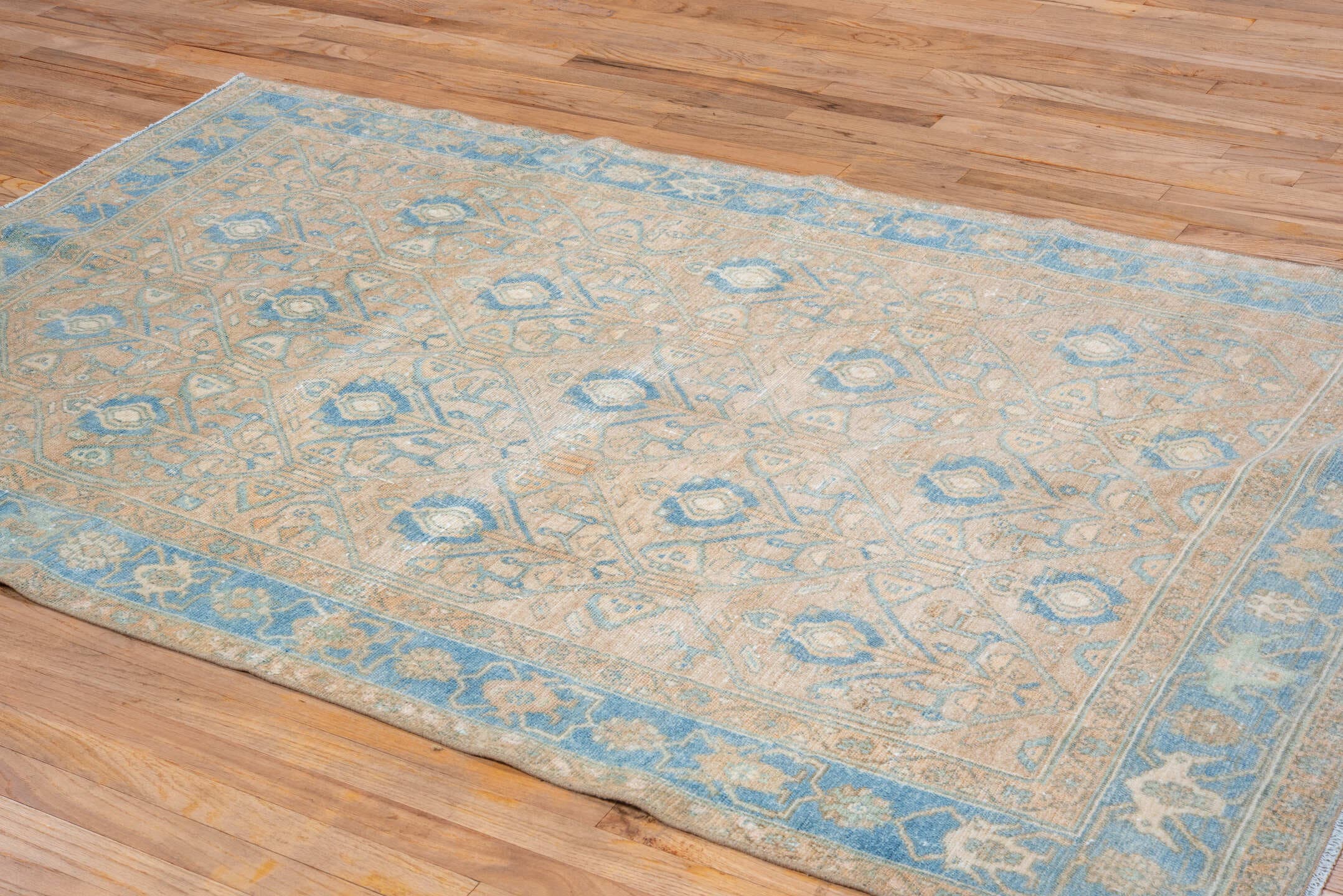 4' x 7' one-of-a-kind handmade vintage Malayer rug. Color palette: beige, sky blue, ivory, tan, camel, light blue