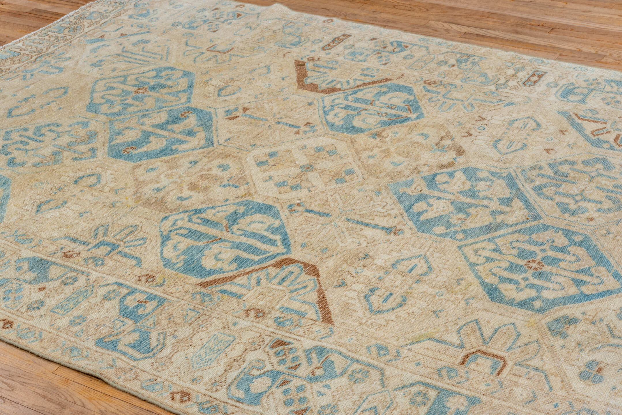 7' x 10' one-of-a-kind handmade vintage Baktiary large size rug. Color palette: brown, gray, light gray, off-white, pink