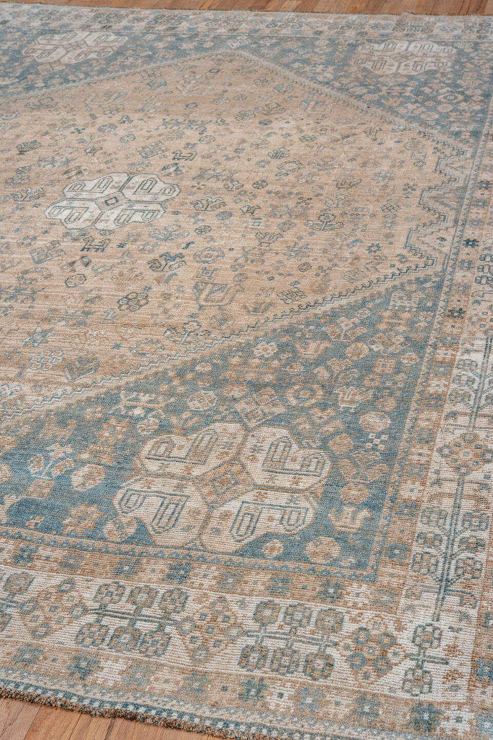 7' x 10' one-of-a-kind handmade vintage Shiraz large size rug. Color palette: ivory, sky blue, beige, taupe, camel, slate