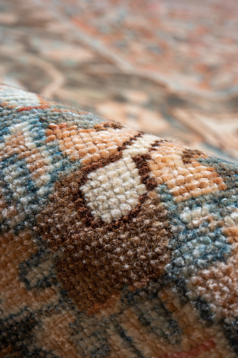 12' x 17' one-of-a-kind handmade vintage Baktiary oversize rug. Color palette: rust, charcoal, sky blue, ivory, taupe, camel