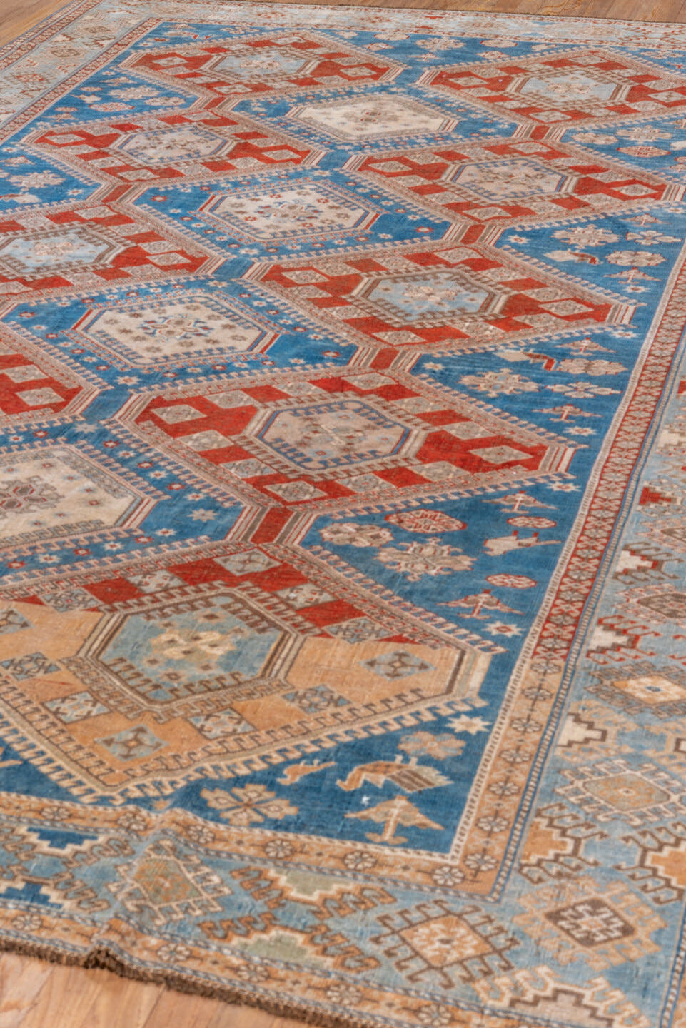 7' x 10' one-of-a-kind handmade vintage Shiraz large size rug. Color palette: blue, ivory, rust, light blue, camel, taupe