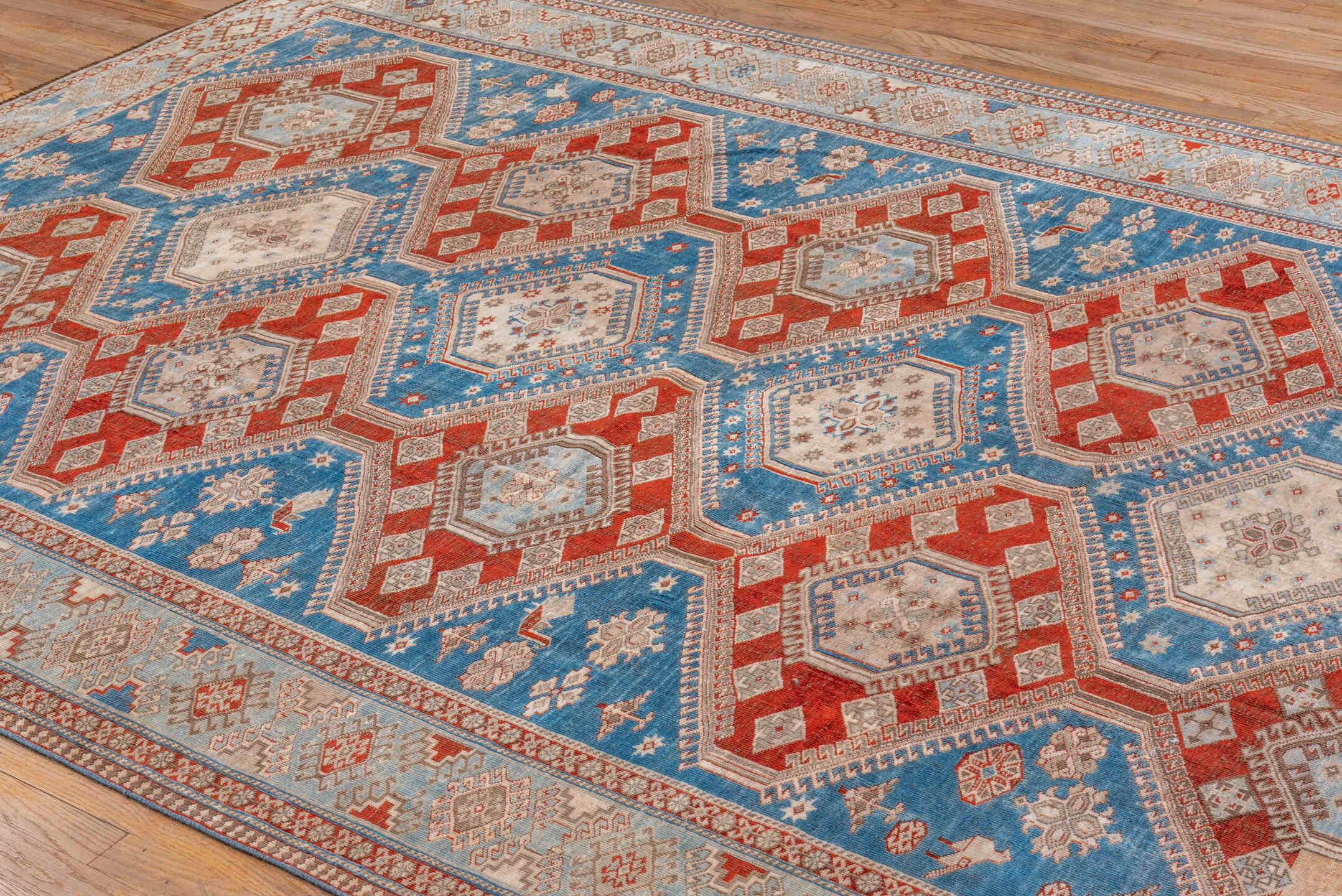 7' x 10' one-of-a-kind handmade vintage Shiraz large size rug. Color palette: blue, ivory, rust, light blue, camel, taupe