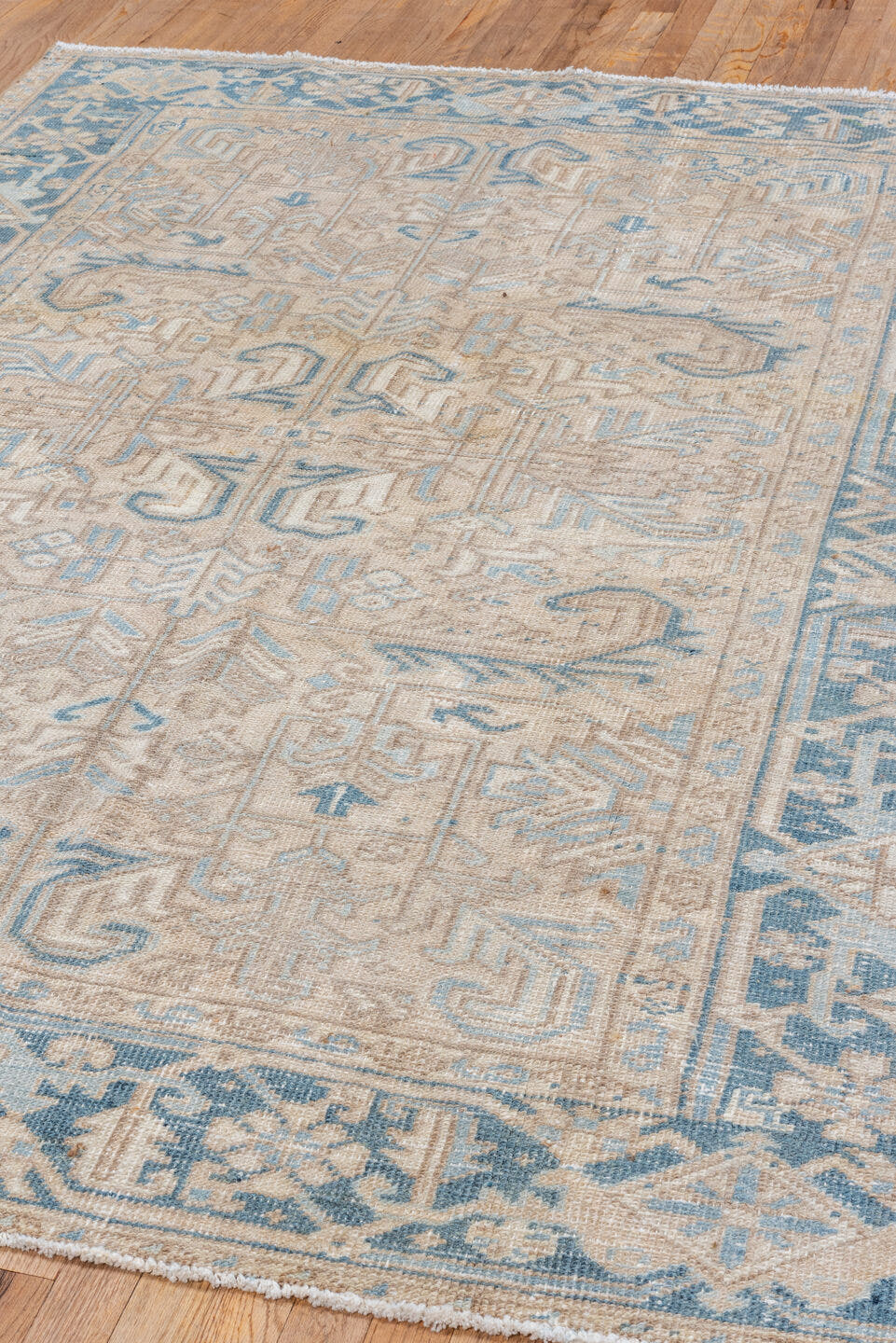 6' x 8' one-of-a-kind handmade vintage Heriz medium size rug. Color palette: ivory, sky blue, beige, taupe, cream