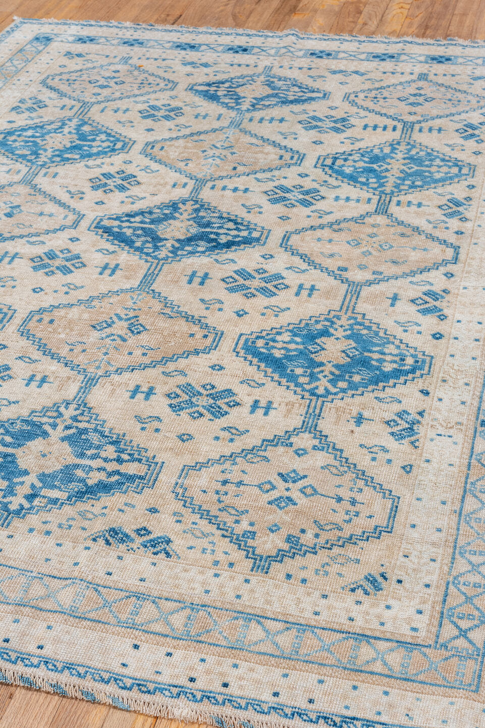 5' x 6' one-of-a-kind handmade vintage Afshar rug. Color palette: ivory, sky blue, beige, camel, light blue