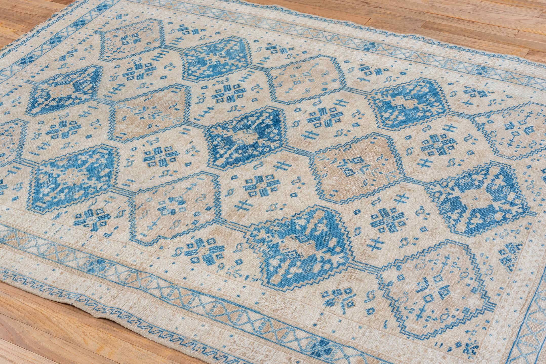 5' x 6' one-of-a-kind handmade vintage Afshar rug. Color palette: ivory, sky blue, beige, camel, light blue