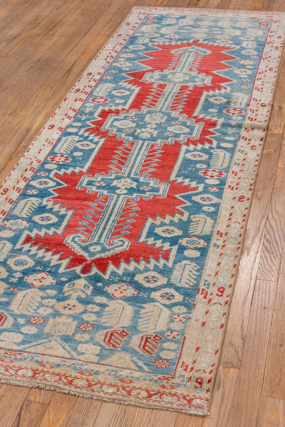 2' x 8' one-of-a-kind handmade vintage Malayer runner rug. Color palette: sky blue, ivory, rust, brick red, cream, camel
