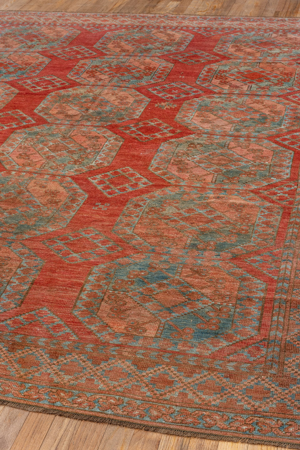 7' x 8' one-of-a-kind handmade vintage Afghan rug. Color palette: rust, terra cotta, dusty rose, sage, taupe, brown