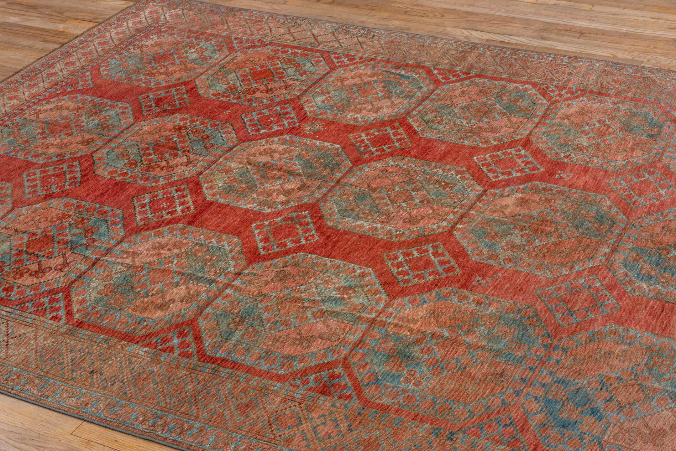 7' x 8' one-of-a-kind handmade vintage Afghan rug. Color palette: rust, terra cotta, dusty rose, sage, taupe, brown