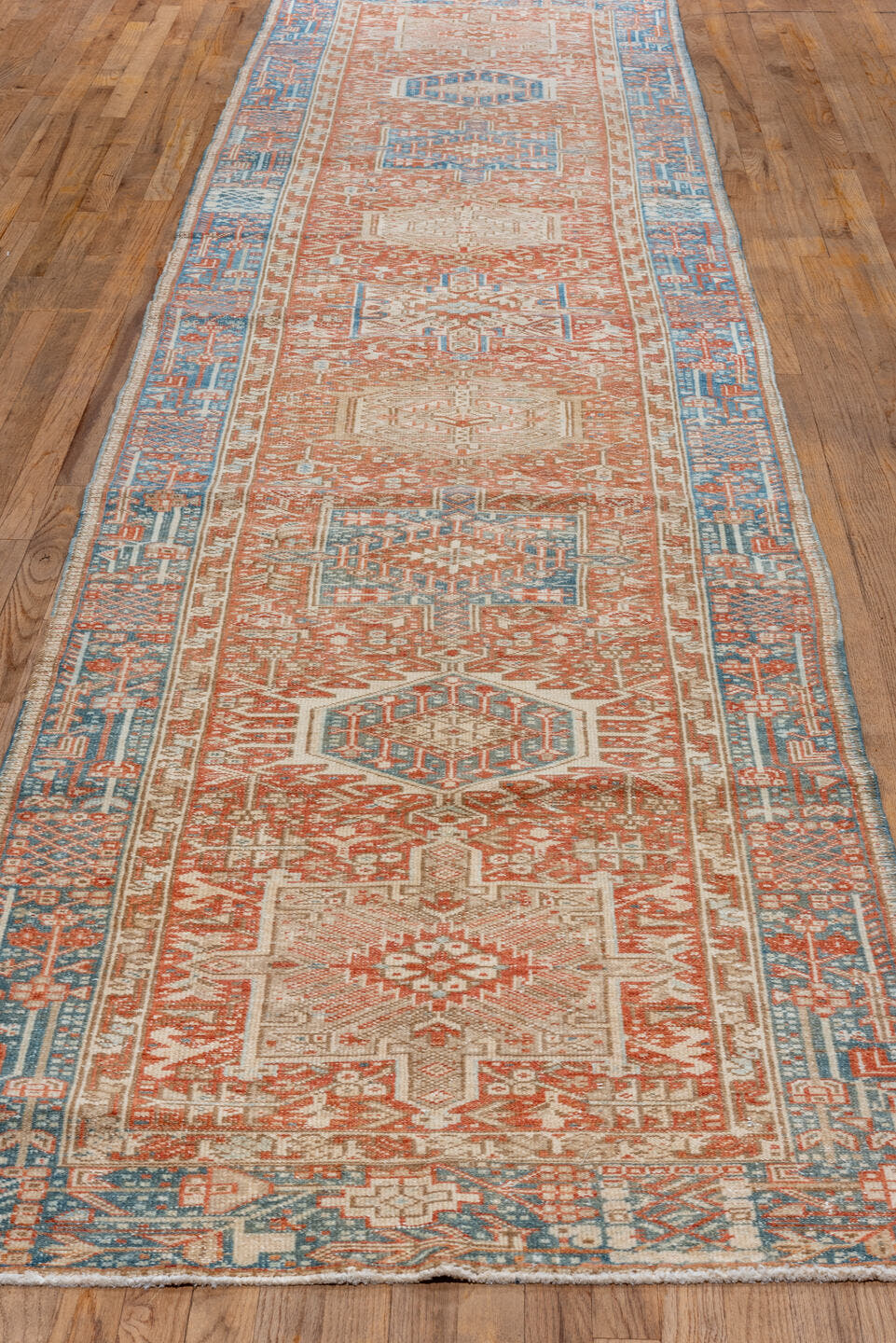 3' x 16' one-of-a-kind handmade vintage Karaje runner rug. Color palette: rust, sky blue, ivory, terracotta, camel, slate