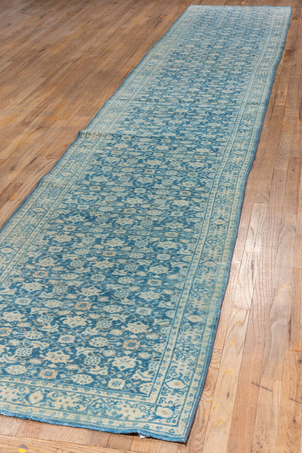 2' x 16' one-of-a-kind handmade vintage Tabriz runner rug. Color palette: blue, ivory, sky blue, navy, cream, light blue