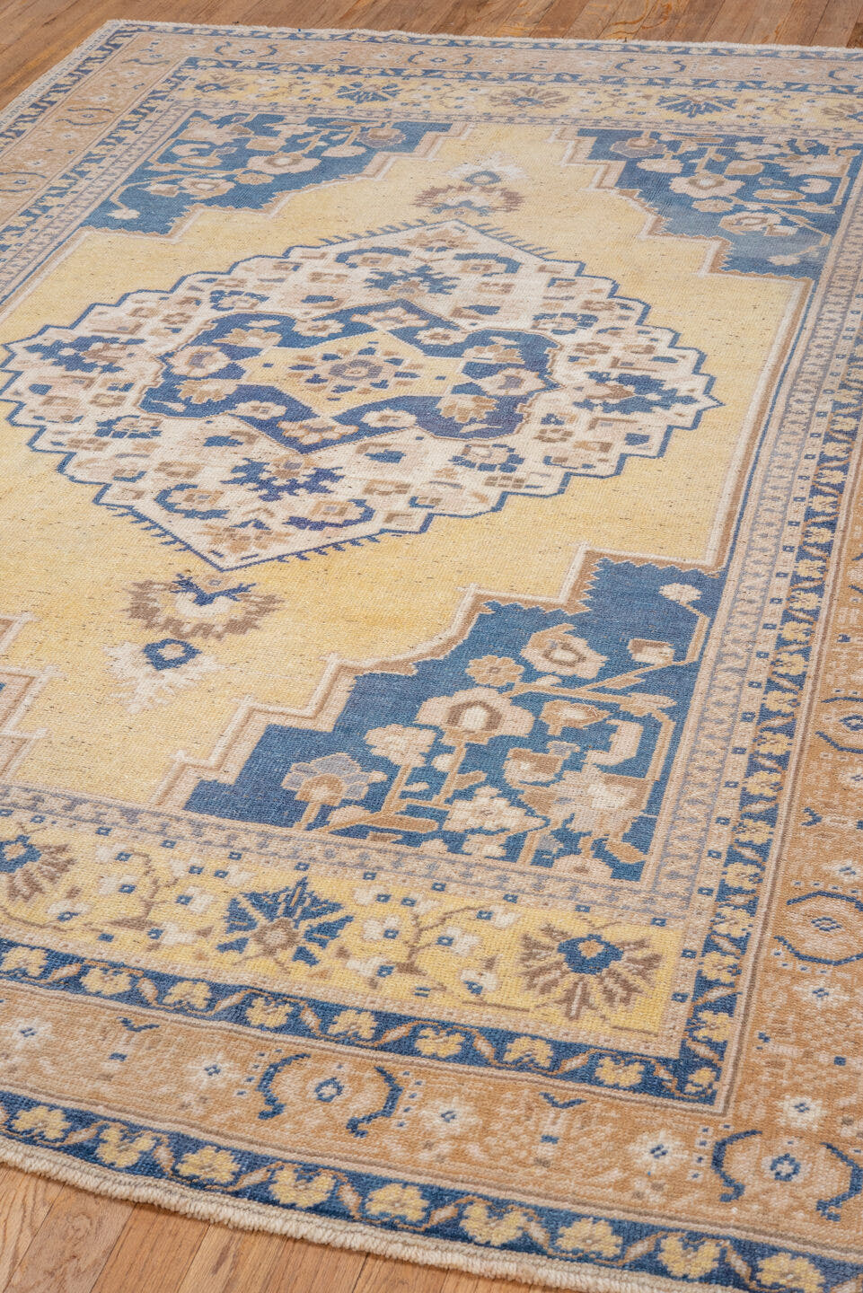 5' x 8' one-of-a-kind handmade vintage Oushak medium size rug. Color palette: ivory, blue, pale yellow, beige, taupe, gold
