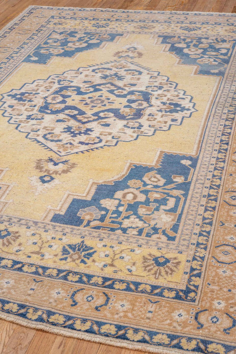 5' x 8' one-of-a-kind handmade vintage Oushak medium size rug. Color palette: ivory, blue, pale yellow, beige, taupe, gold