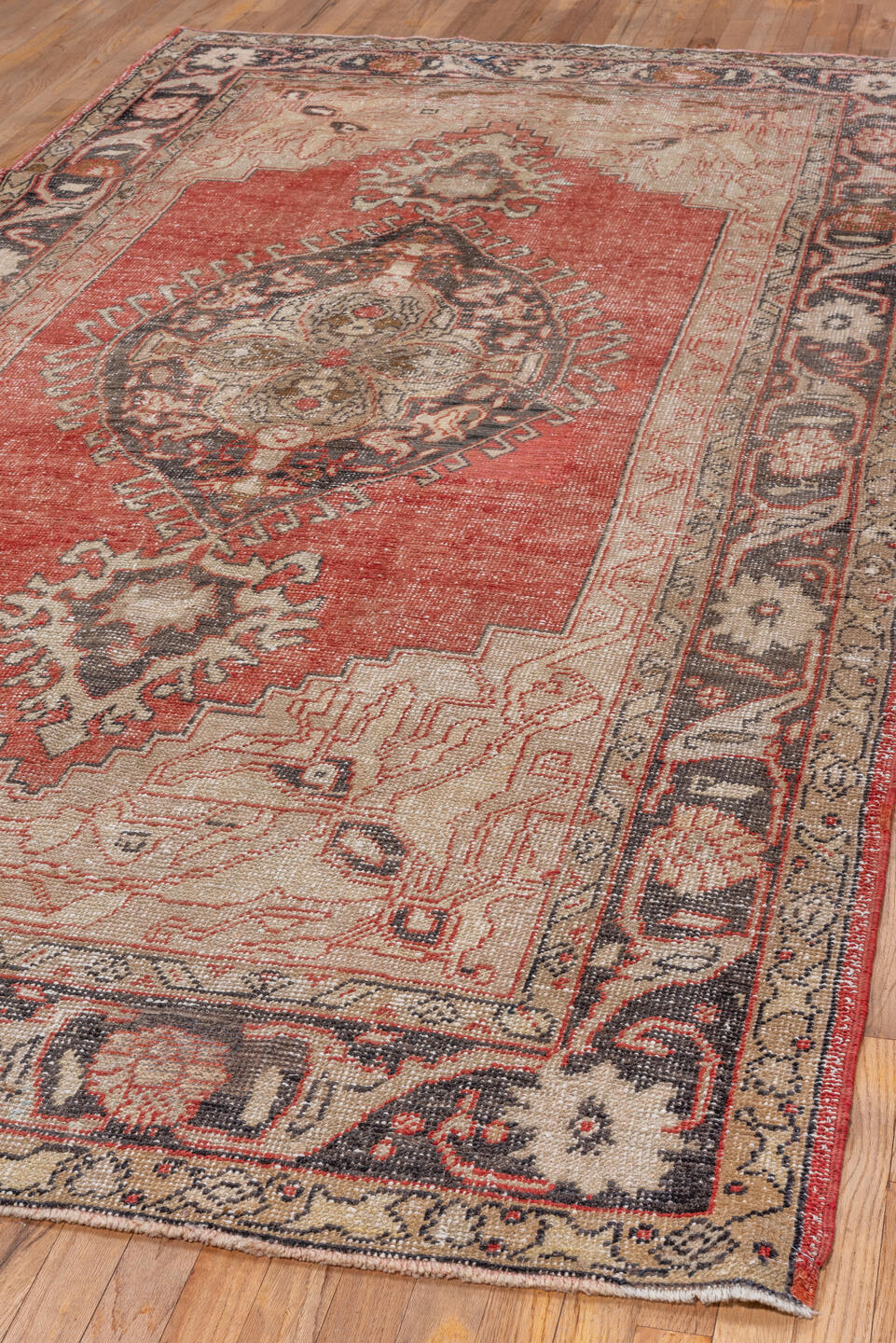 5' x 11' one-of-a-kind handmade vintage Oushak rug. Color palette: brown, gray, light gray, off-white, pink, red