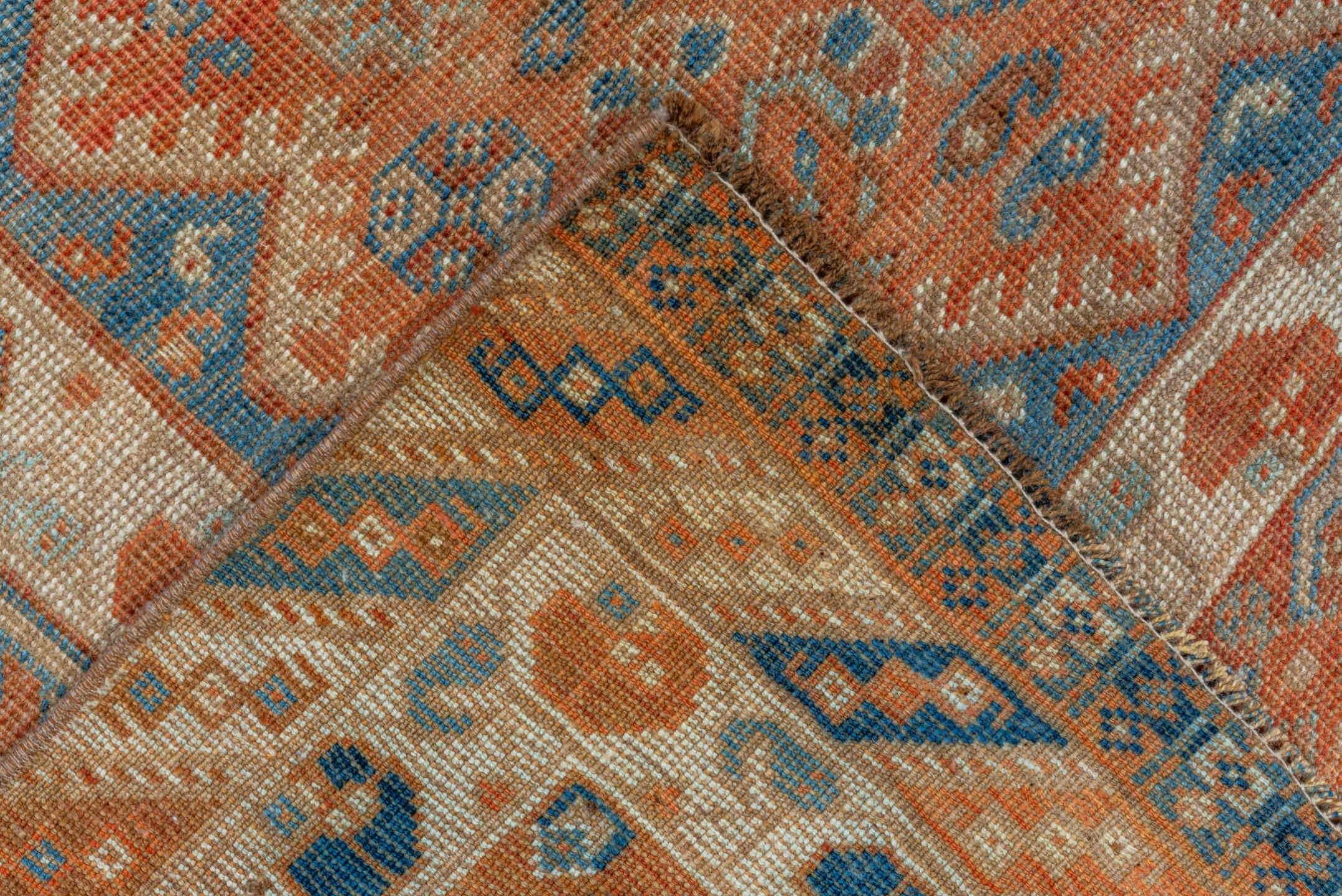 7' x 10' one-of-a-kind handmade vintage Shiraz large size rug. Color palette: terra cotta, ivory, slate, rust, blue, camel
