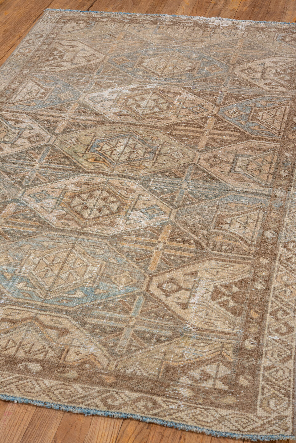 3' x 6' one-of-a-kind handmade vintage Baktiary small size rug. Color palette: taupe, ivory, sky blue, camel, brown, sand