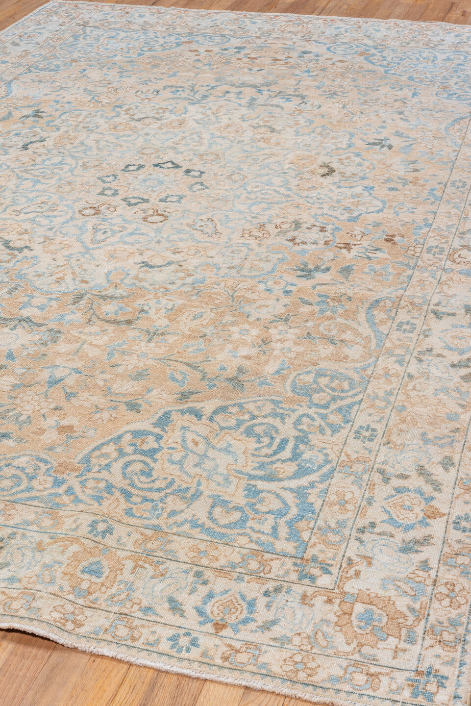 6' x 10' one-of-a-kind handmade vintage Baktiary large size rug. Color palette: ivory, beige, sky_blue, taupe, camel, slate
