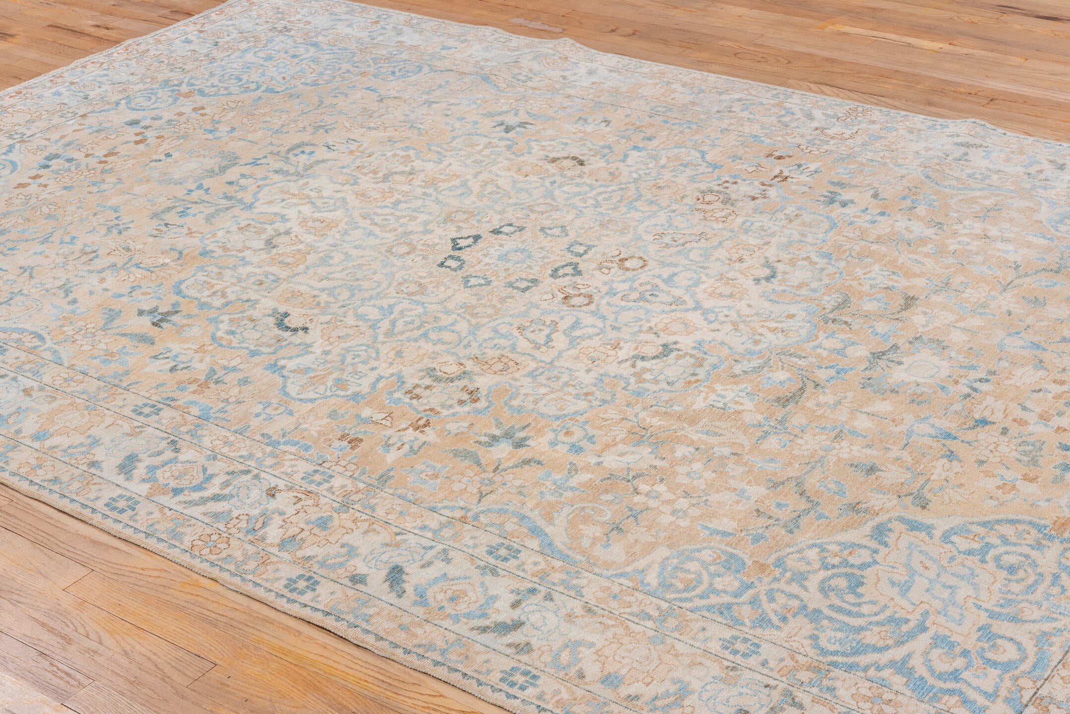 6' x 10' one-of-a-kind handmade vintage Baktiary large size rug. Color palette: ivory, beige, sky_blue, taupe, camel, slate