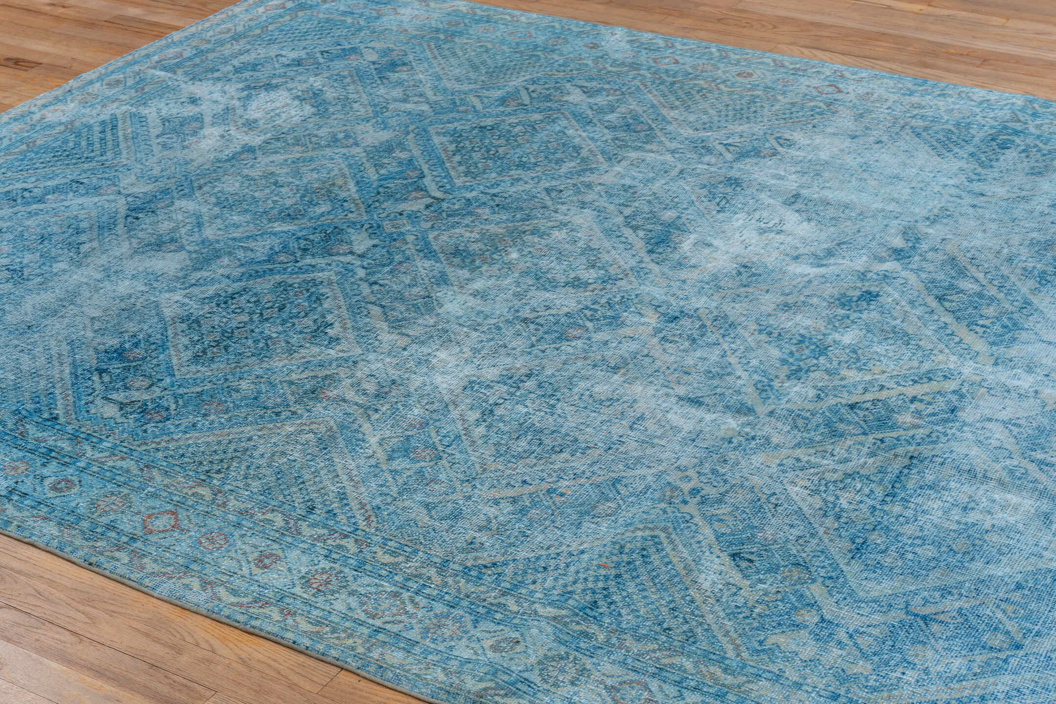 7' x 9' one-of-a-kind handmade vintage Veece rug. Color palette: aqua, sky blue, ivory, slate, taupe, rust, teal, light blue