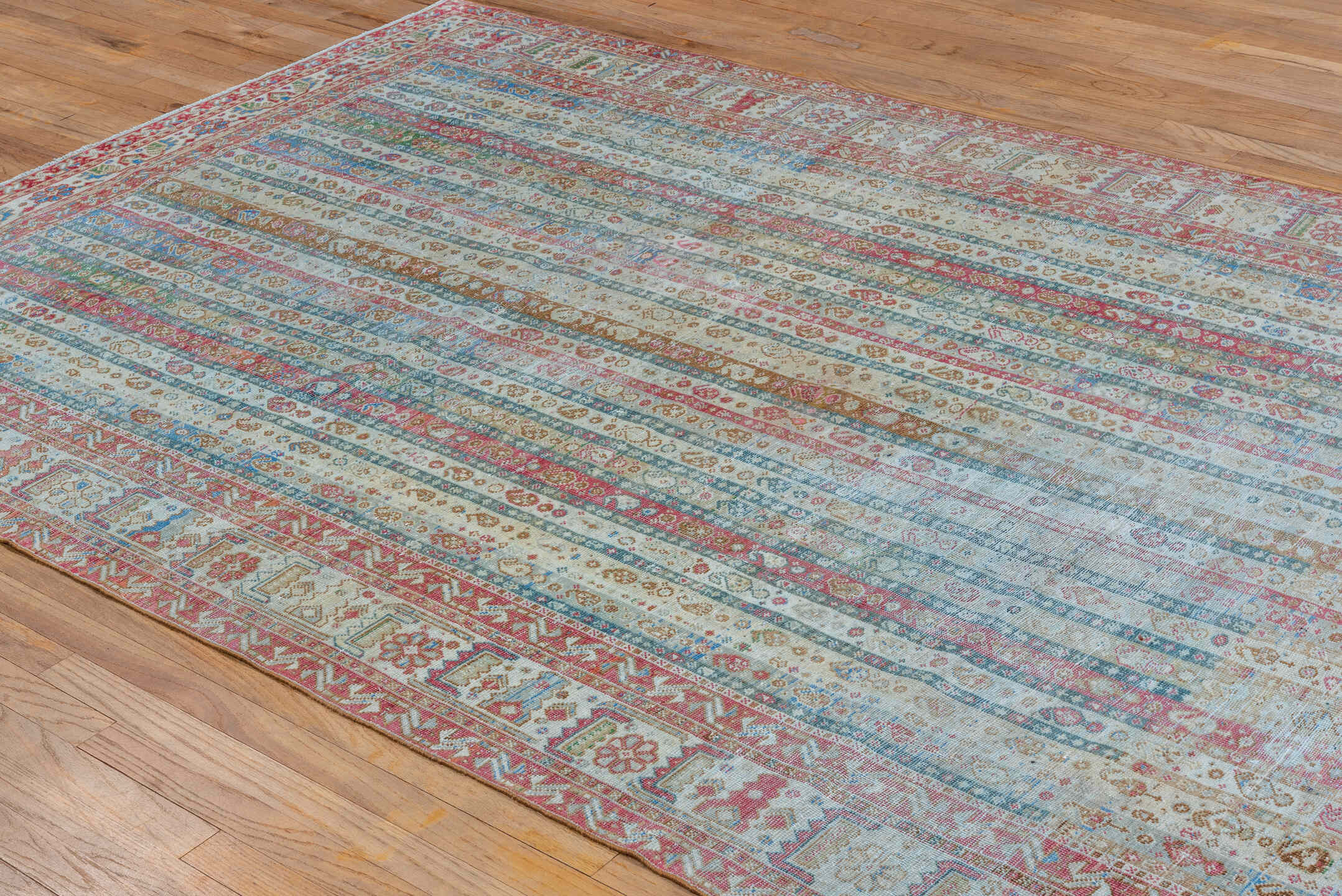 6' x 10' one-of-a-kind handmade vintage Sivas large size rug. Color palette: ivory, sky blue, rose, rust, taupe, sage, gold