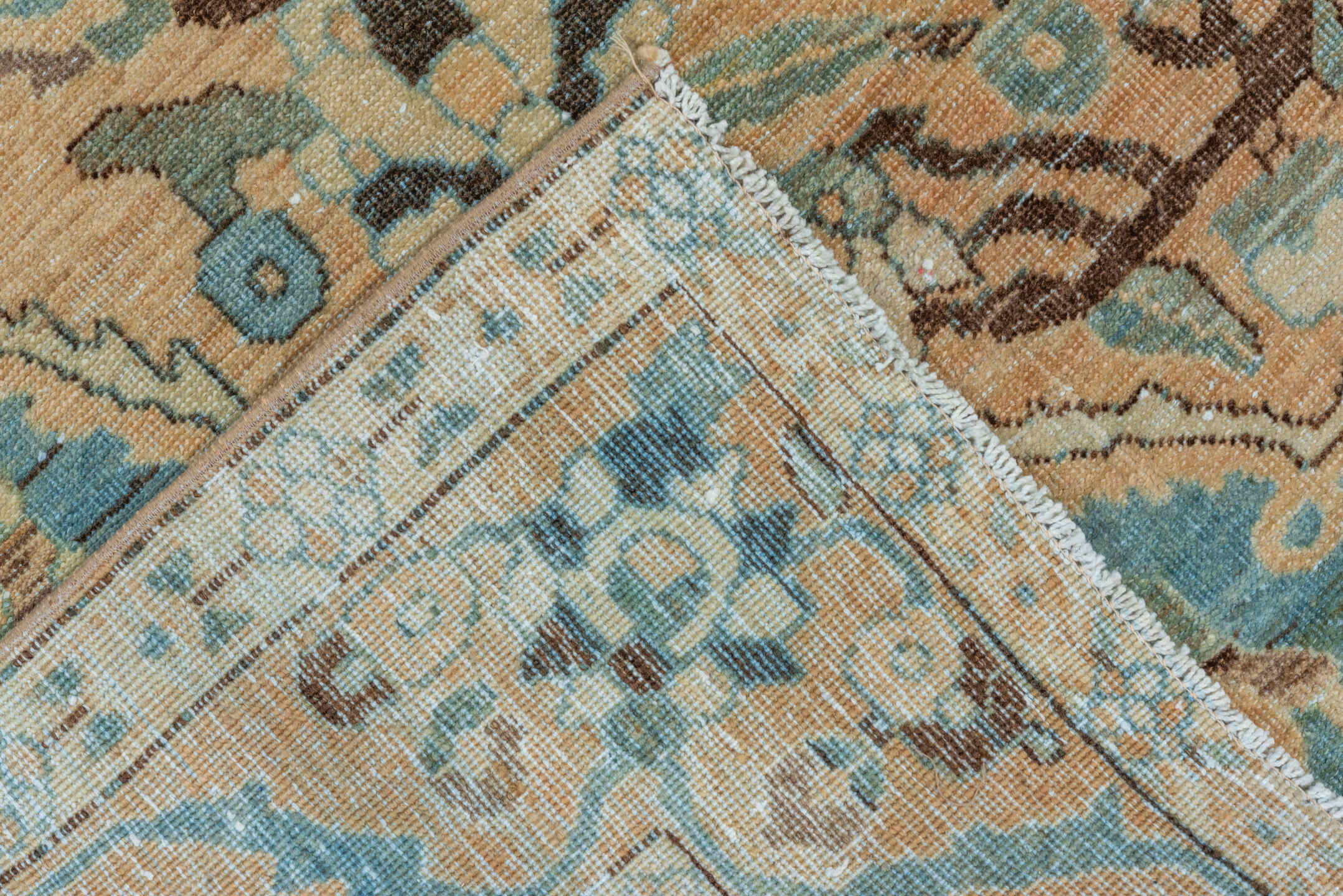 6' x 10' one-of-a-kind handmade vintage Baktiary large size rug. Color palette: blue, brown, gray, off-white, orange, tan