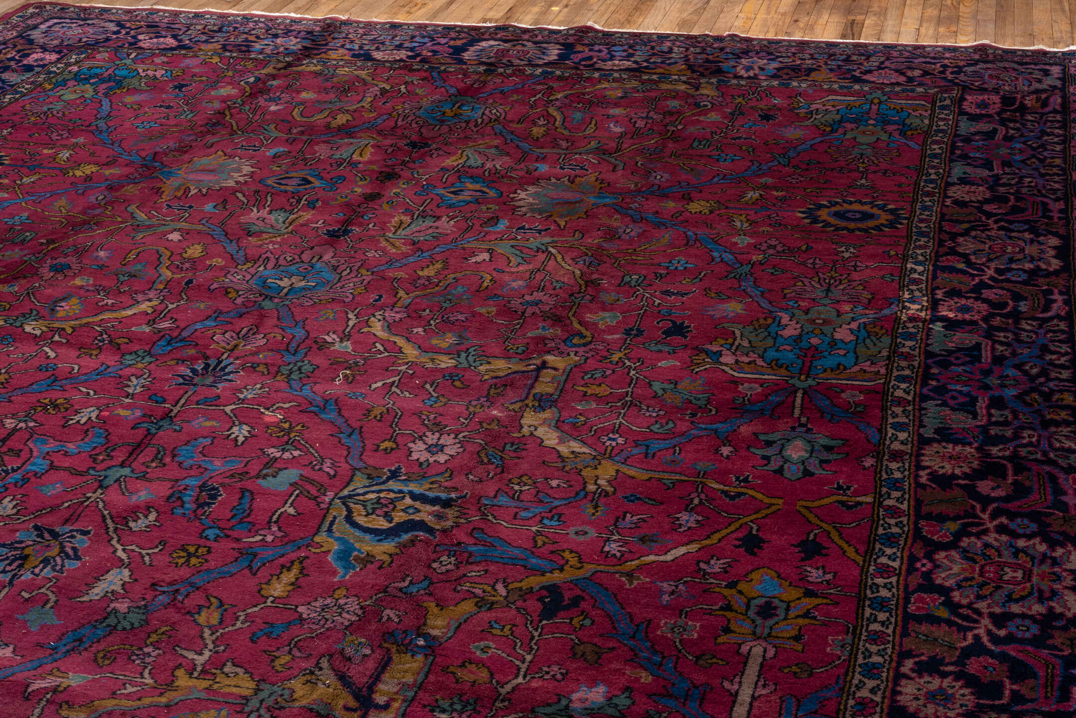 11' x 20' one-of-a-kind handmade vintage Agra oversize rug. Color palette: raspberry, navy, sky blue, rose, gold, burgundy