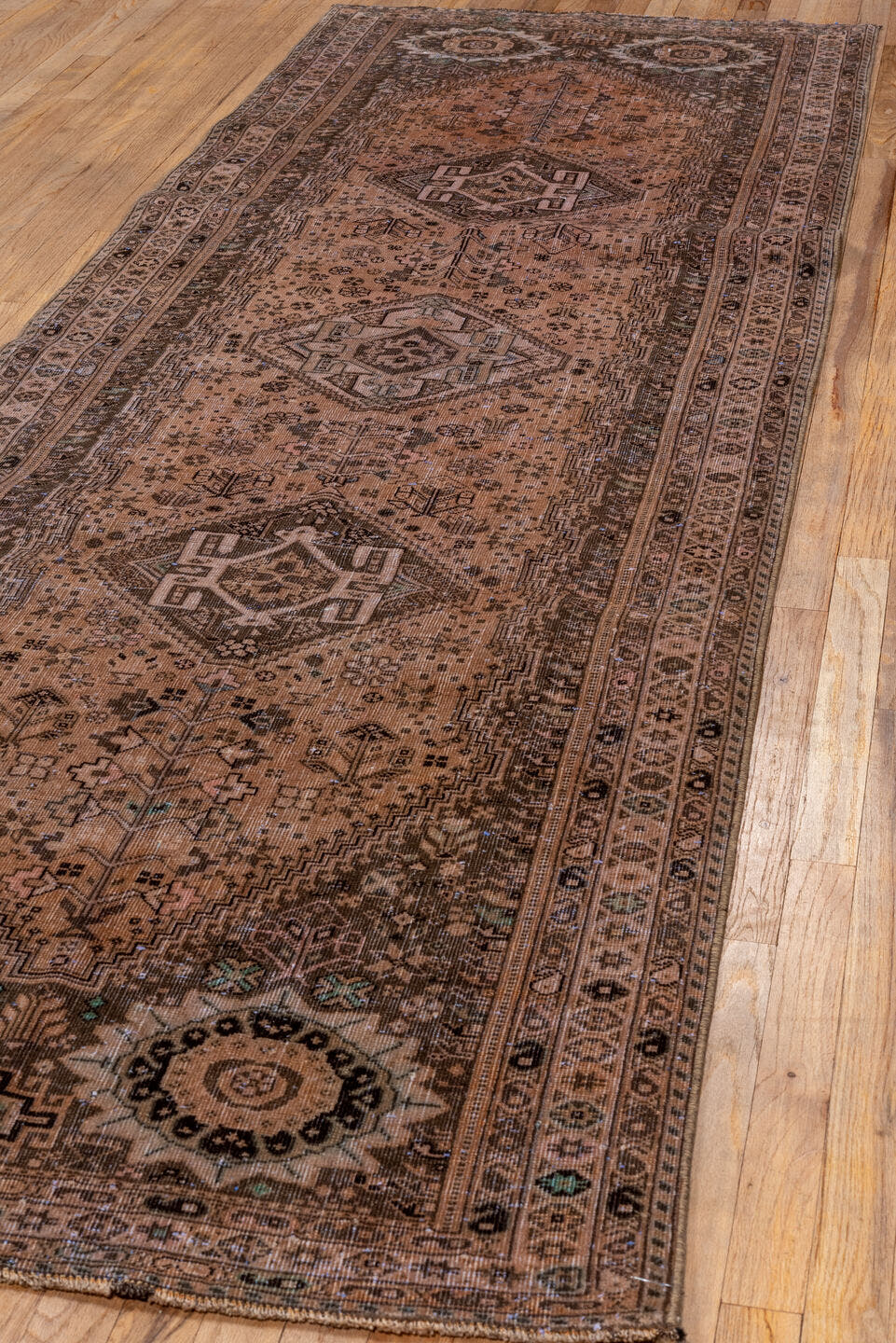 3' x 10' one-of-a-kind handmade vintage Shiraz runner rug. Color palette: taupe, camel, brown, ivory, charcoal, sage, beige