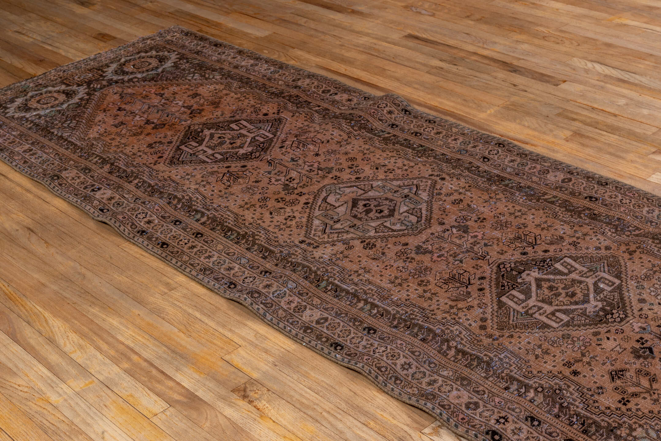 3' x 10' one-of-a-kind handmade vintage Shiraz runner rug. Color palette: taupe, camel, brown, ivory, charcoal, sage, beige