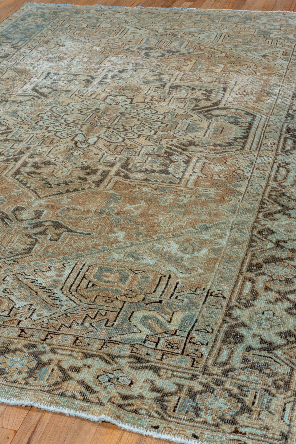 6' x 9' one-of-a-kind handmade vintage Heriz medium size rug. Color palette: camel, ivory, pale blue, taupe, charcoal, beige