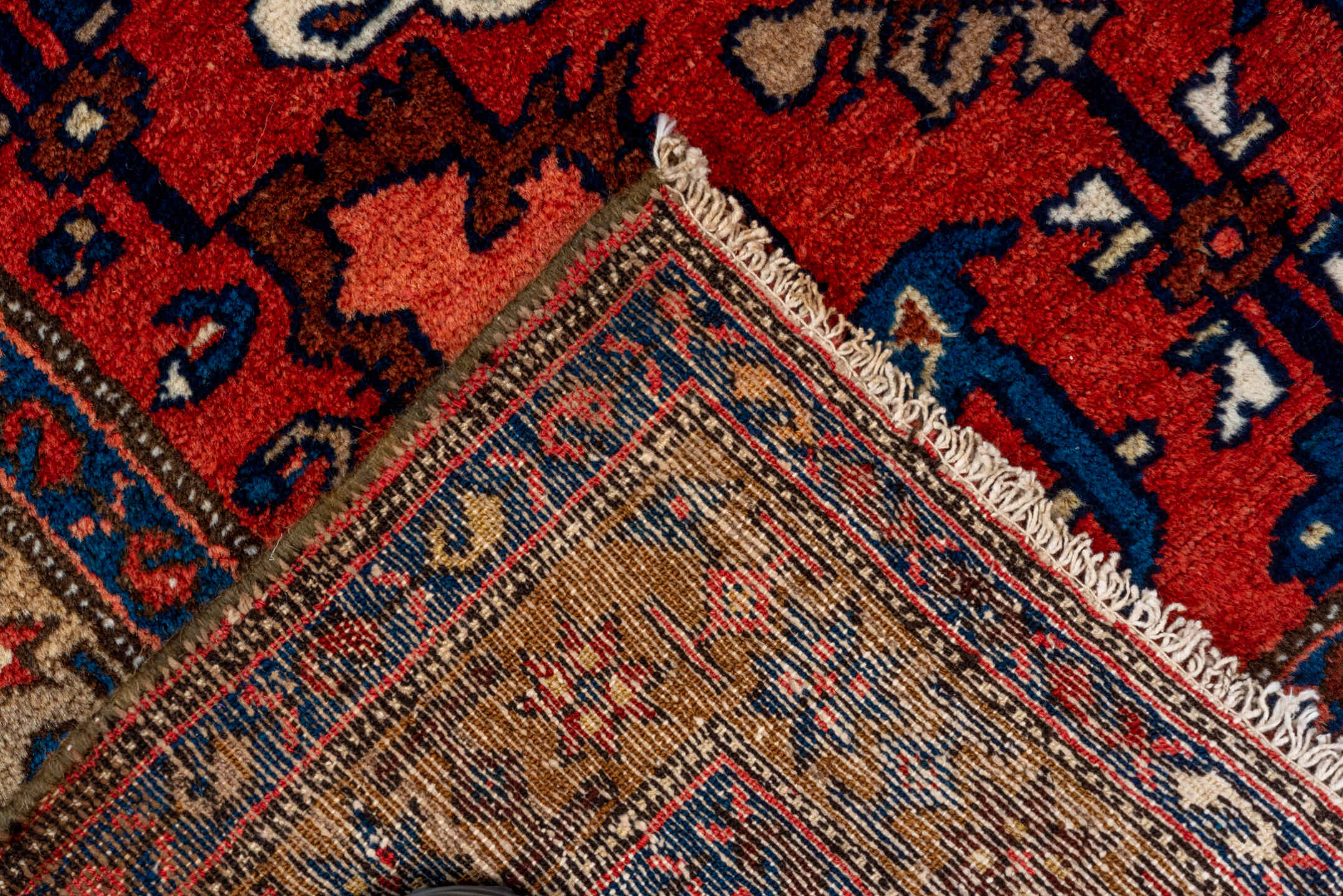 3' x 9' one-of-a-kind handmade vintage Malayer runner rug. Color palette: terra cotta, ivory, navy, blue, rose, brown