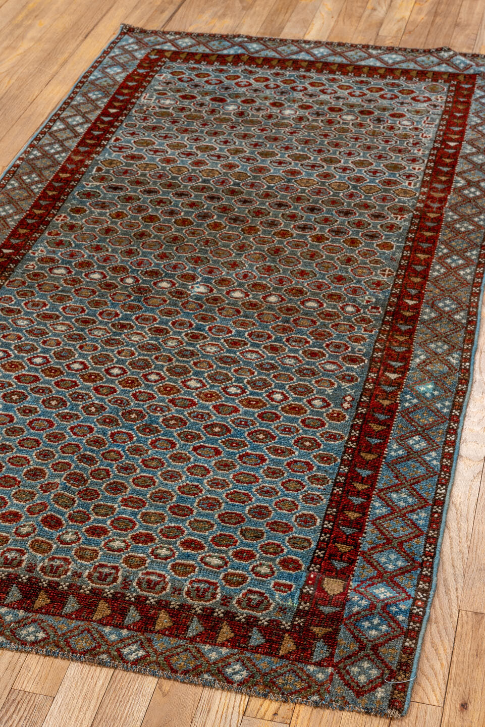 3' x 6' one-of-a-kind handmade vintage Malayer small size rug. Color palette: light blue, rust, ivory, brown, brick red
