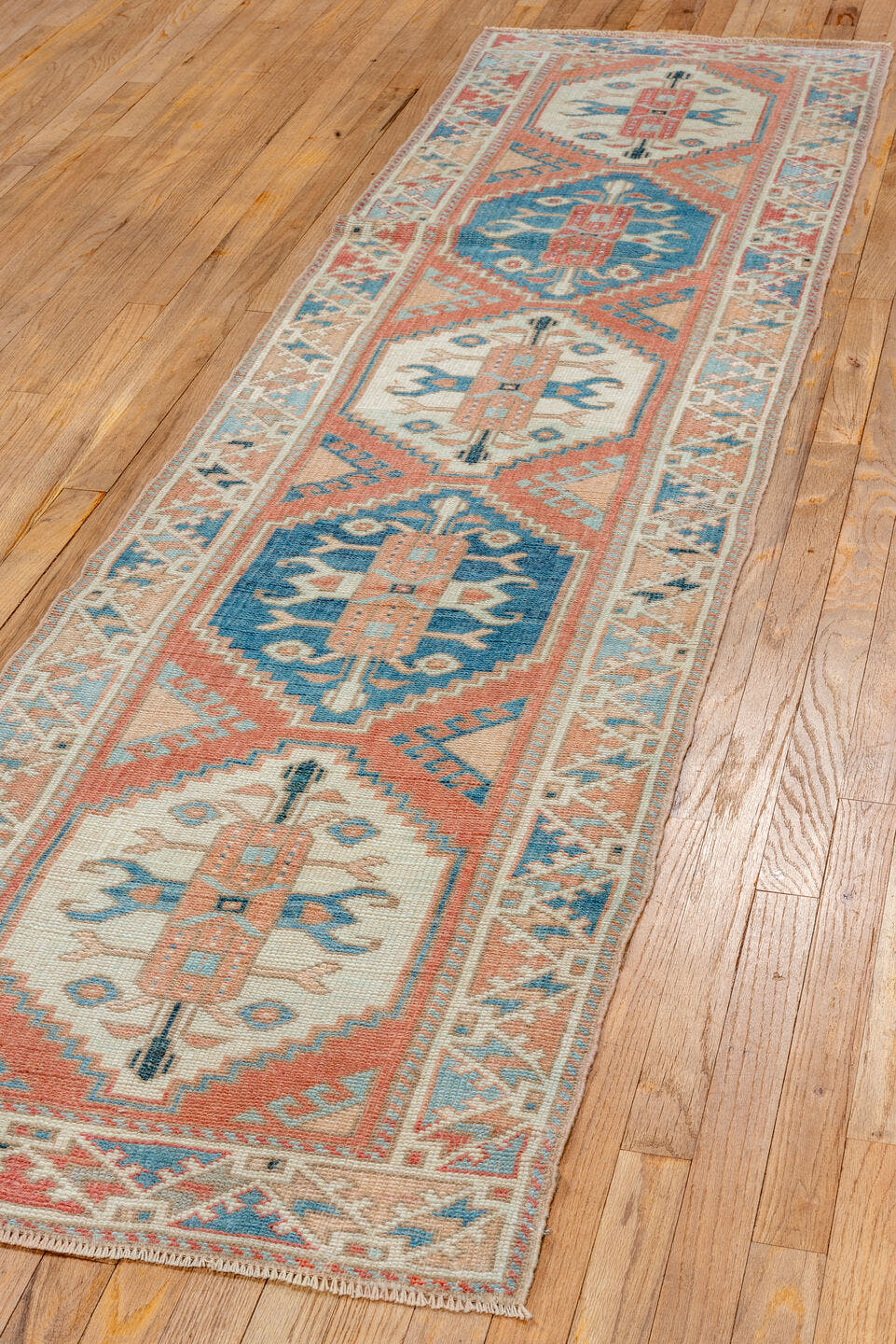 2' x 9' one-of-a-kind handmade vintage Oushak runner rug. Color palette: coral, ivory, sky_blue, beige, taupe, slate, camel