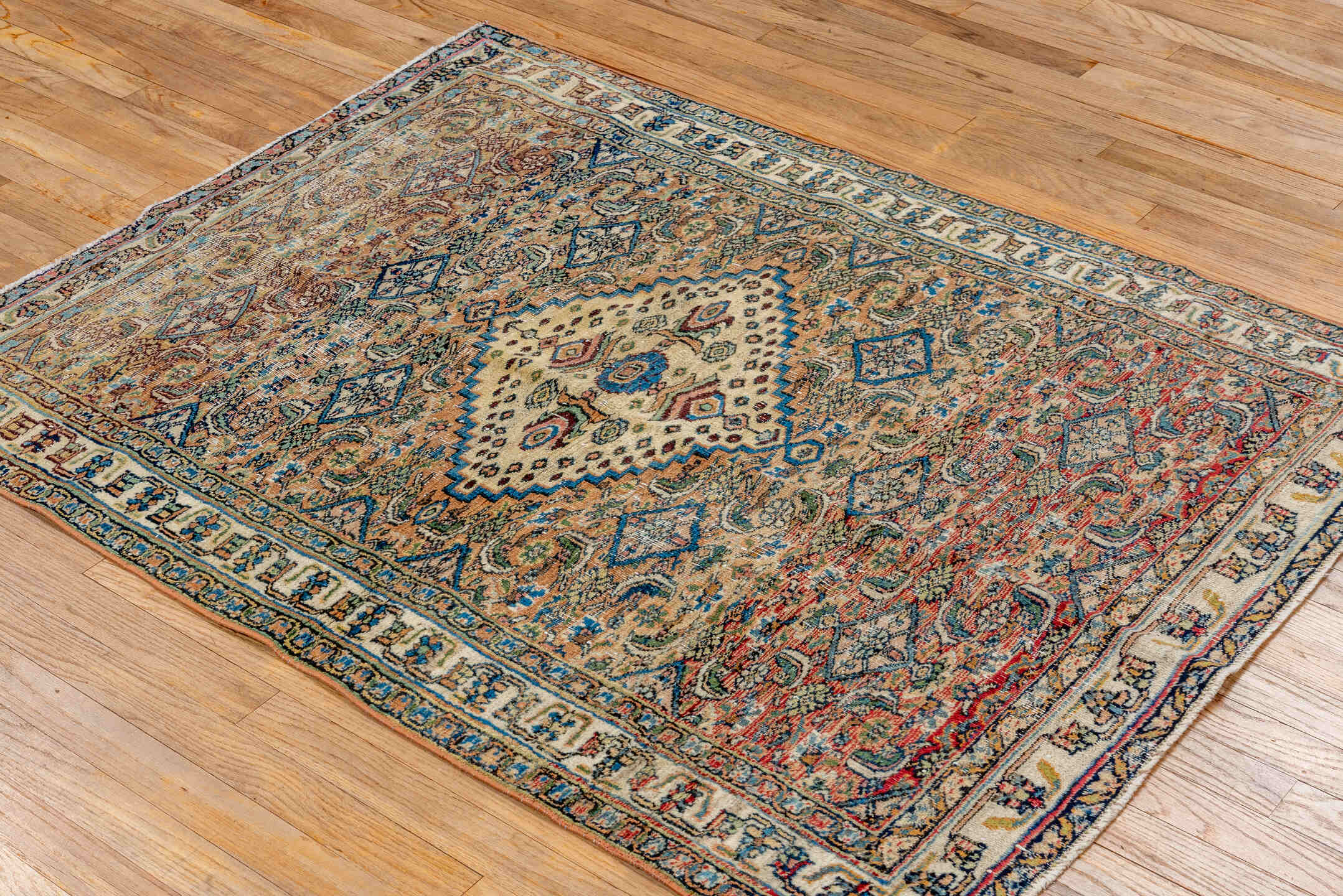 3' x 4' one-of-a-kind handmade vintage Khorassan small size rug. Color palette: ivory, camel, sky_blue, navy, rust, sage