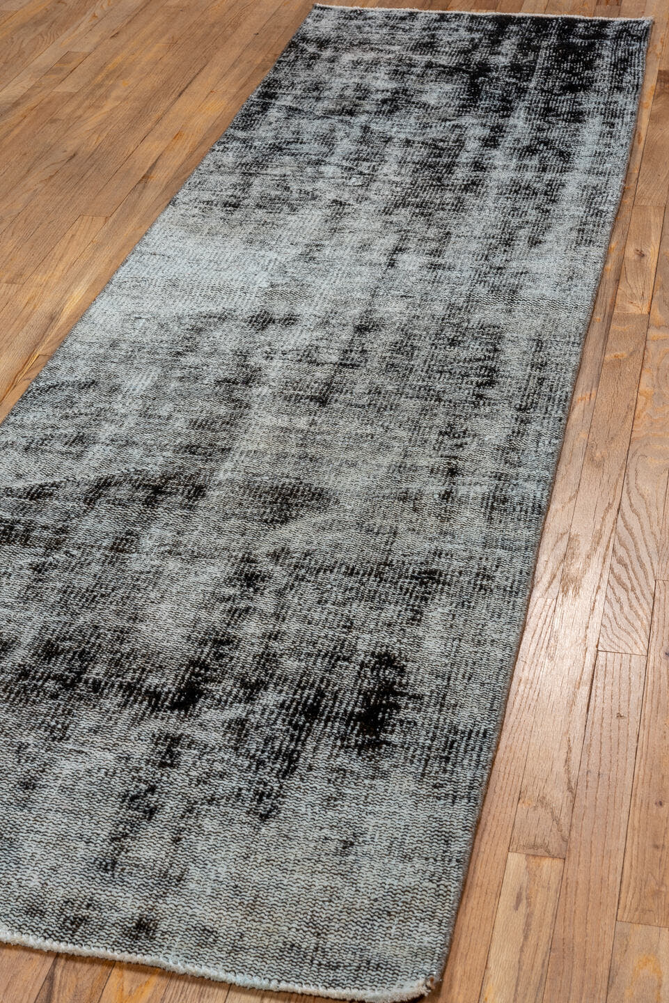 2' x 9' one-of-a-kind handmade vintage Overdyed runner rug. Color palette: silver, charcoal, gray, ivory, black