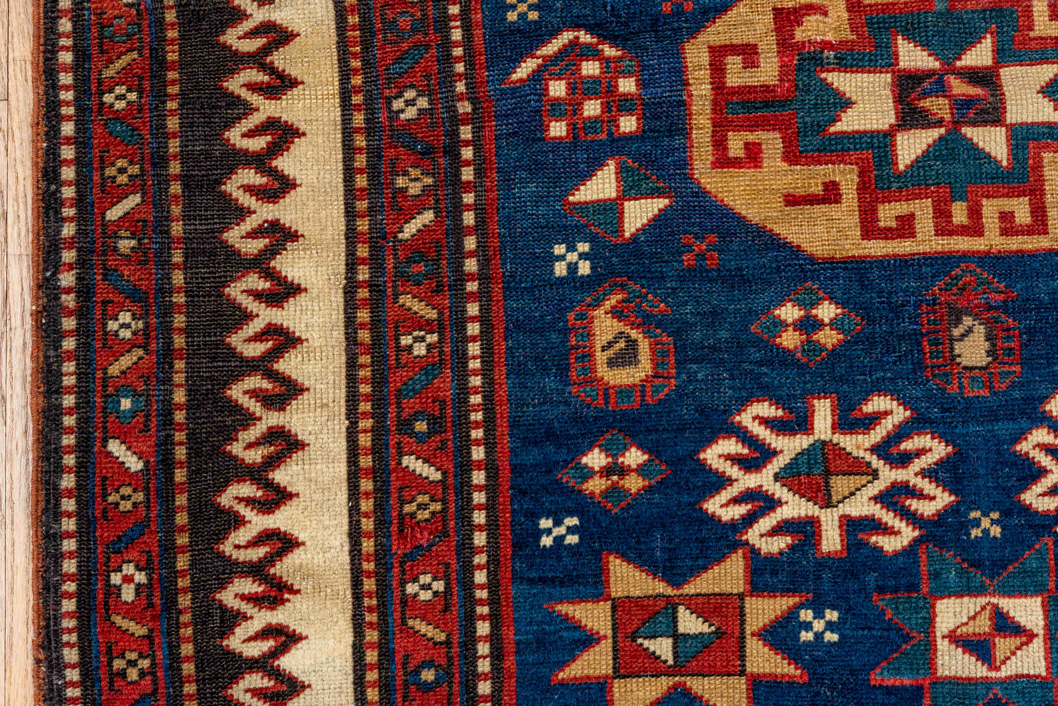 3' x 4' one-of-a-kind handmade vintage Shirvan small size rug. Color palette: blue, ivory, rust, brown, crimson, teal, camel