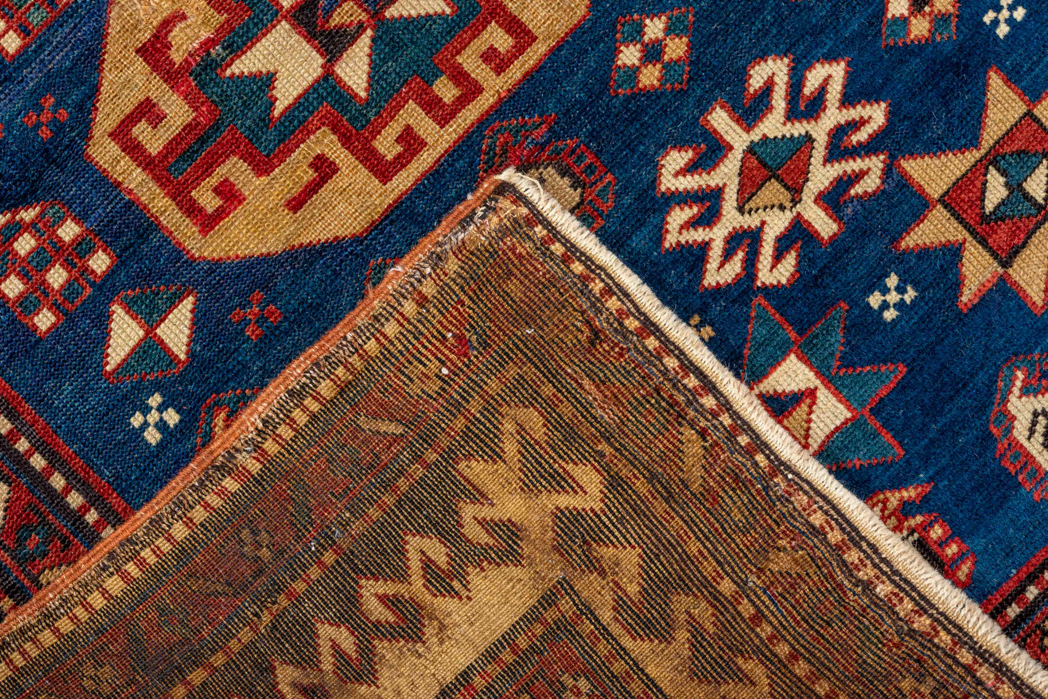 3' x 4' one-of-a-kind handmade vintage Shirvan small size rug. Color palette: blue, ivory, rust, brown, crimson, teal, camel