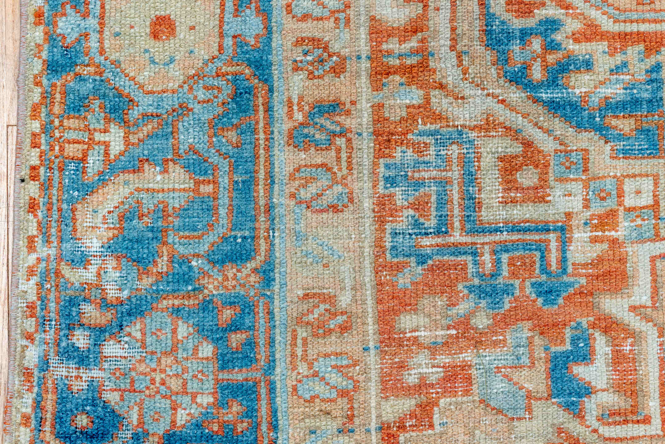 7' x 10' one-of-a-kind handmade vintage Heriz large size rug. Color palette: ivory, sky blue, rust, camel, terracotta